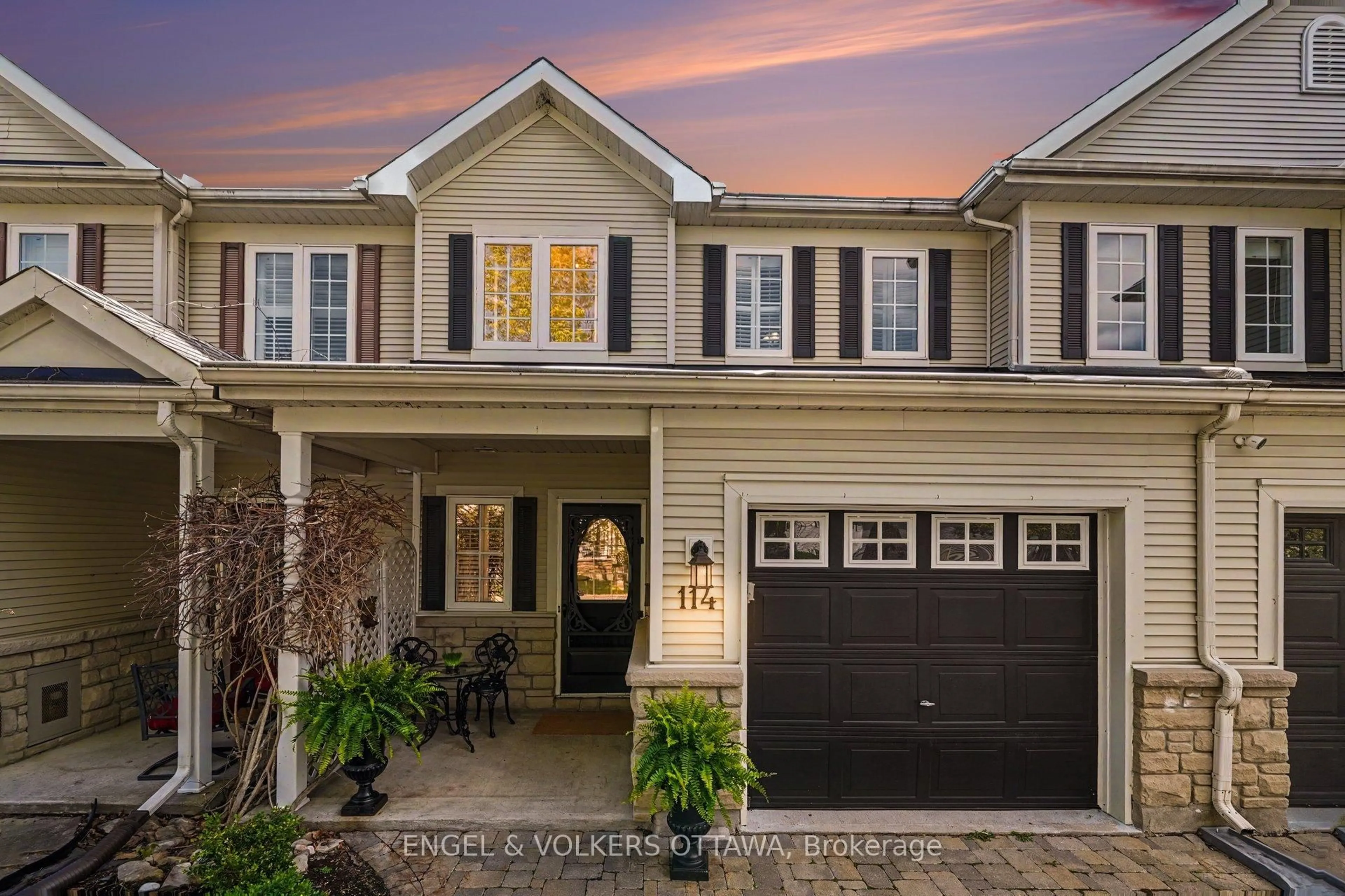 Home with vinyl exterior material, street for 114 Rustwood Private, Ottawa Ontario K2J 5L5