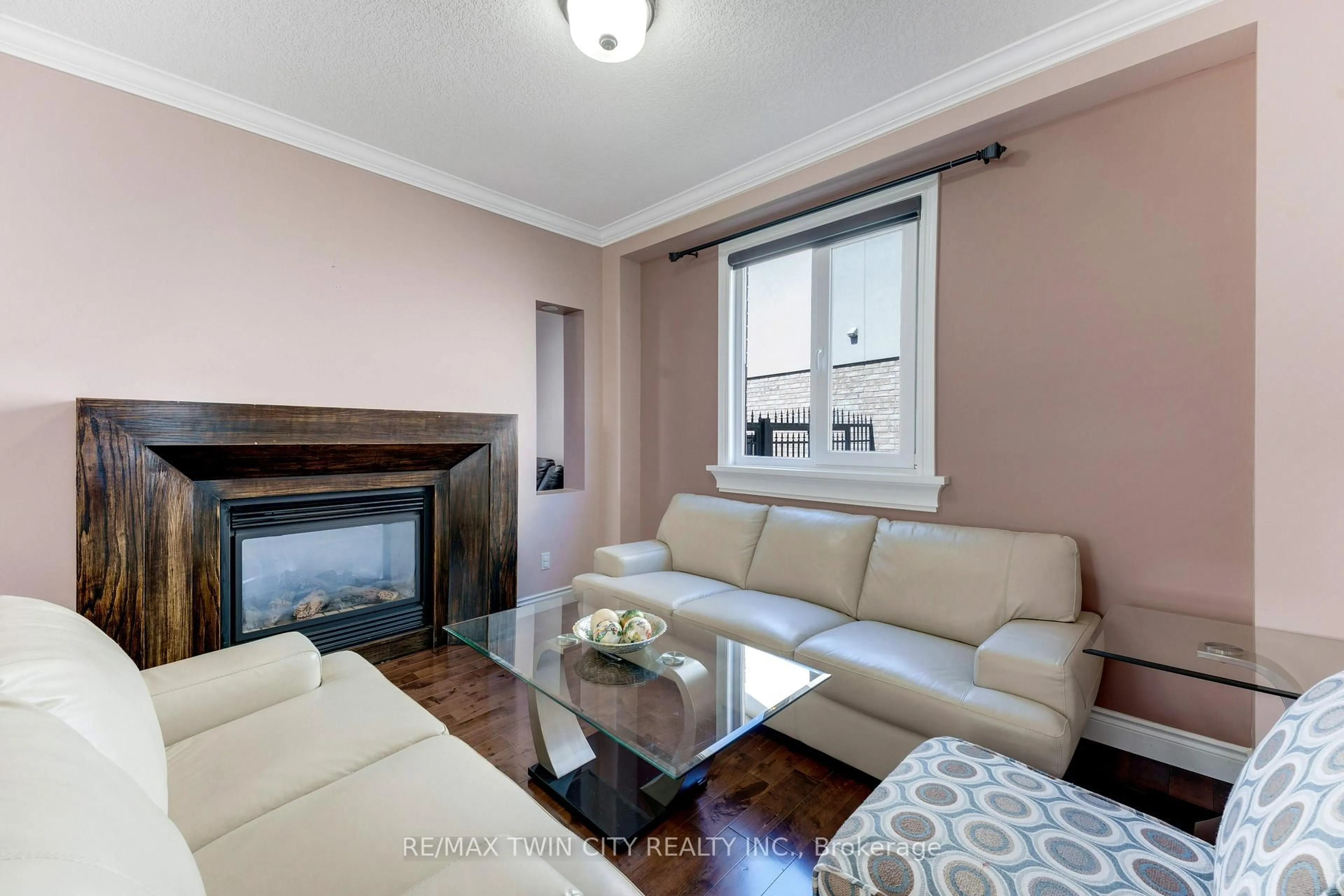 Living room with furniture, wood/laminate floor for 437 Beaumont Cres, Kitchener Ontario N2A 0C4