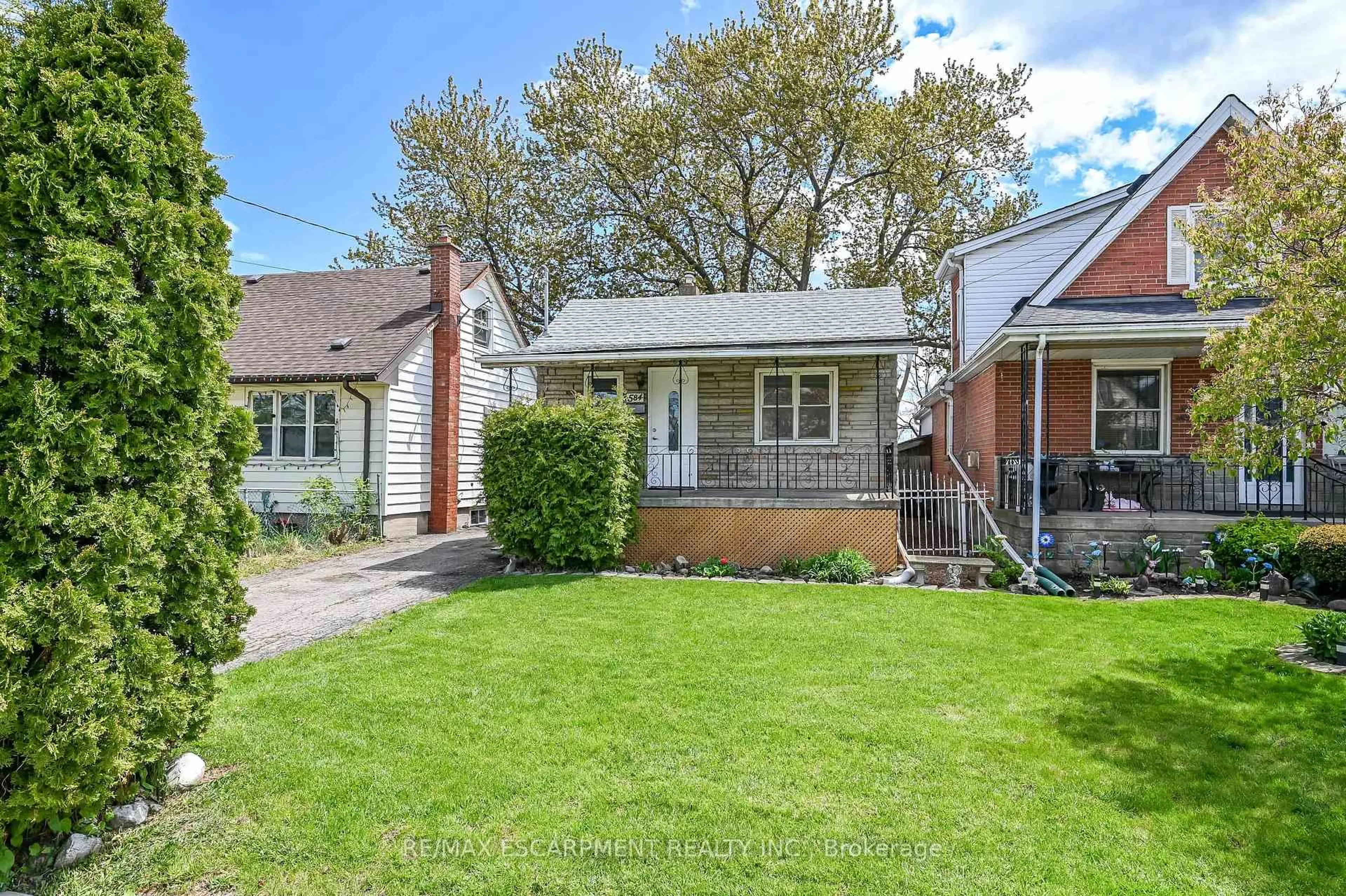 Home with brick exterior material, street for 584 WATERLOO St, Hamilton Ontario L8H 6V5