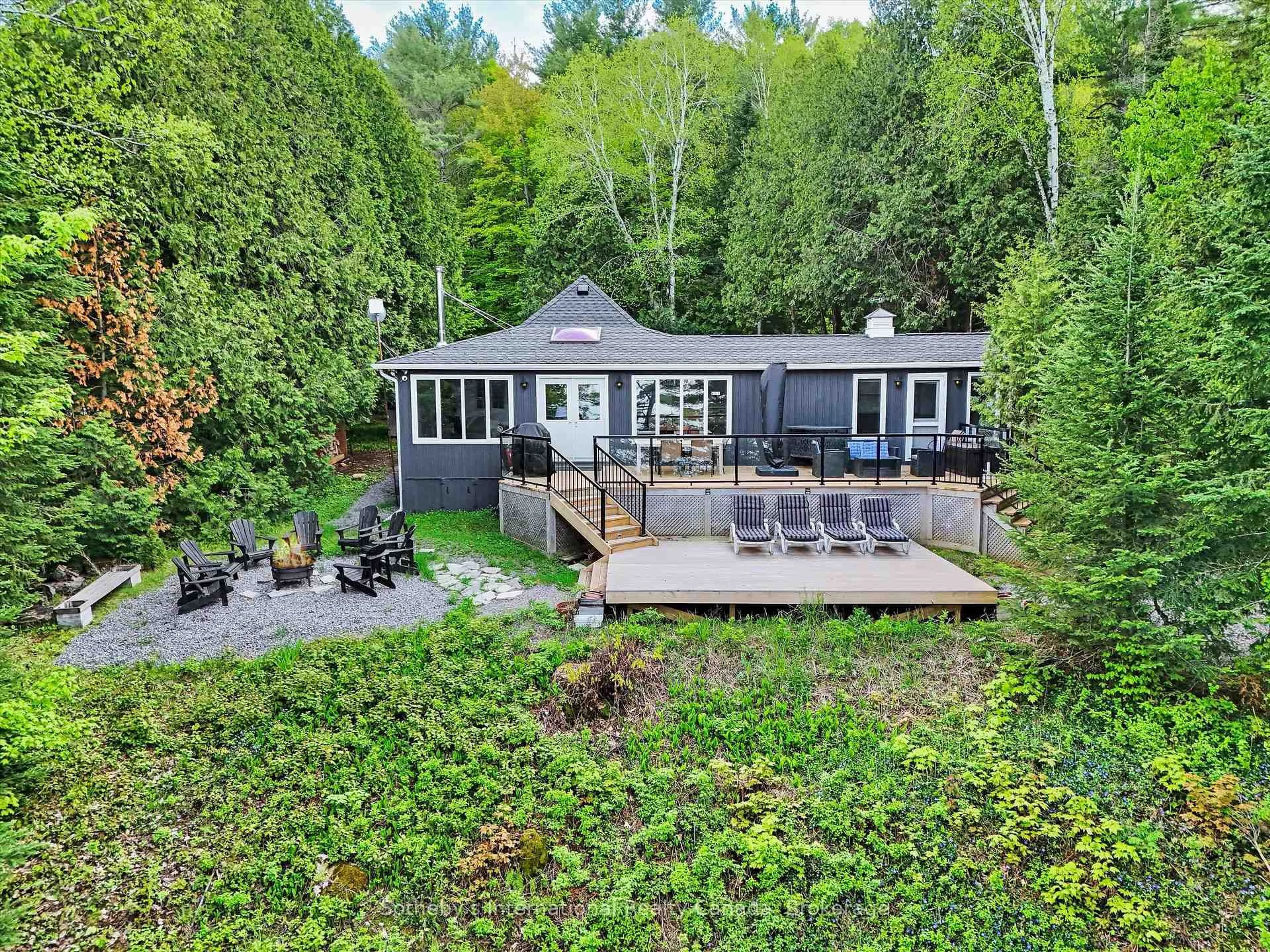 A pic from outside/outdoor area/front of a property/back of a property/a pic from drone, forest/trees view for 1093 Glenmount Rd, Lake of Bays Ontario P0B 1A0