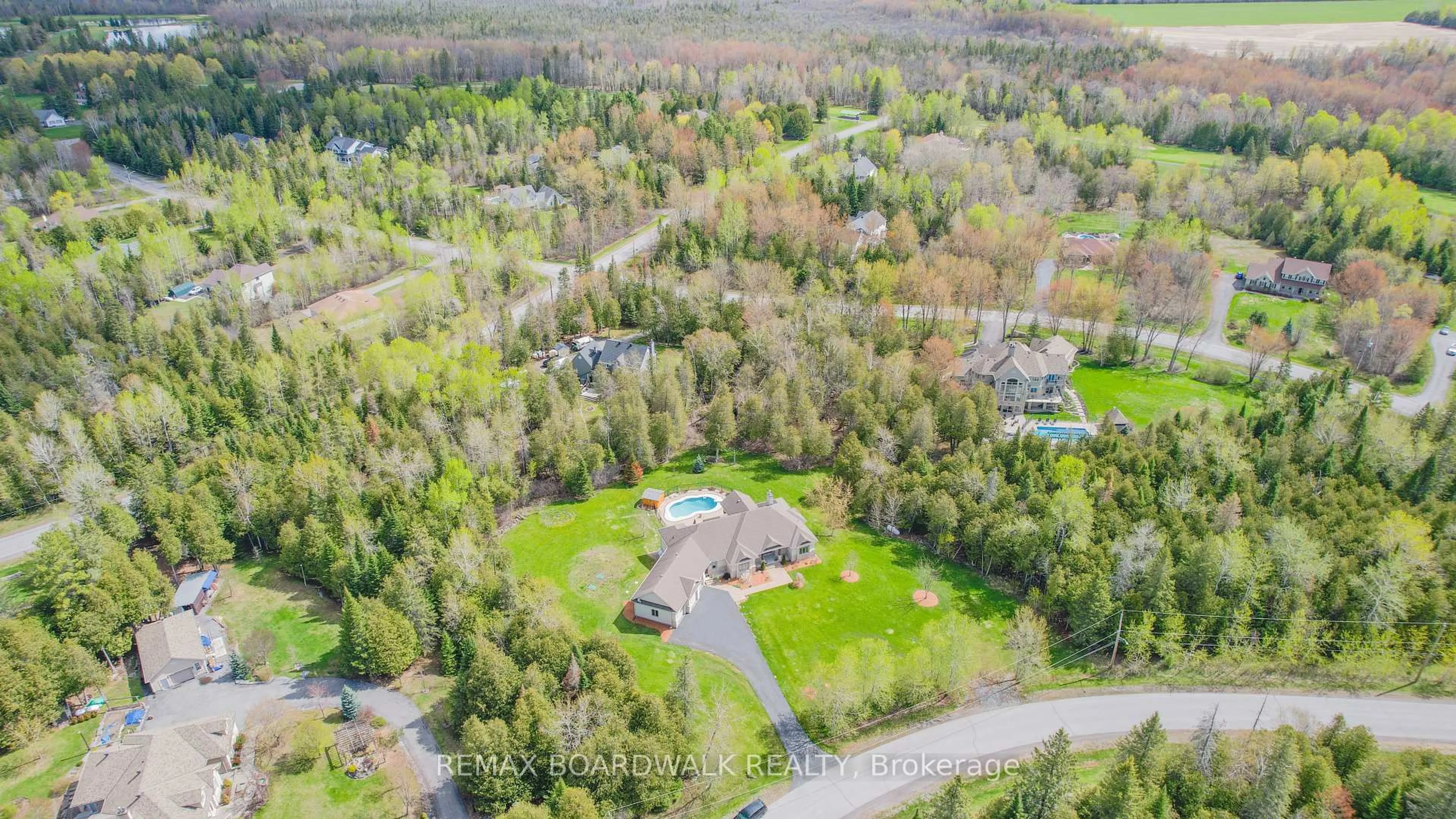 A pic from outside/outdoor area/front of a property/back of a property/a pic from drone, forest/trees view for 49 Sawgrass Circ, Ashton Ontario K0A 1B0