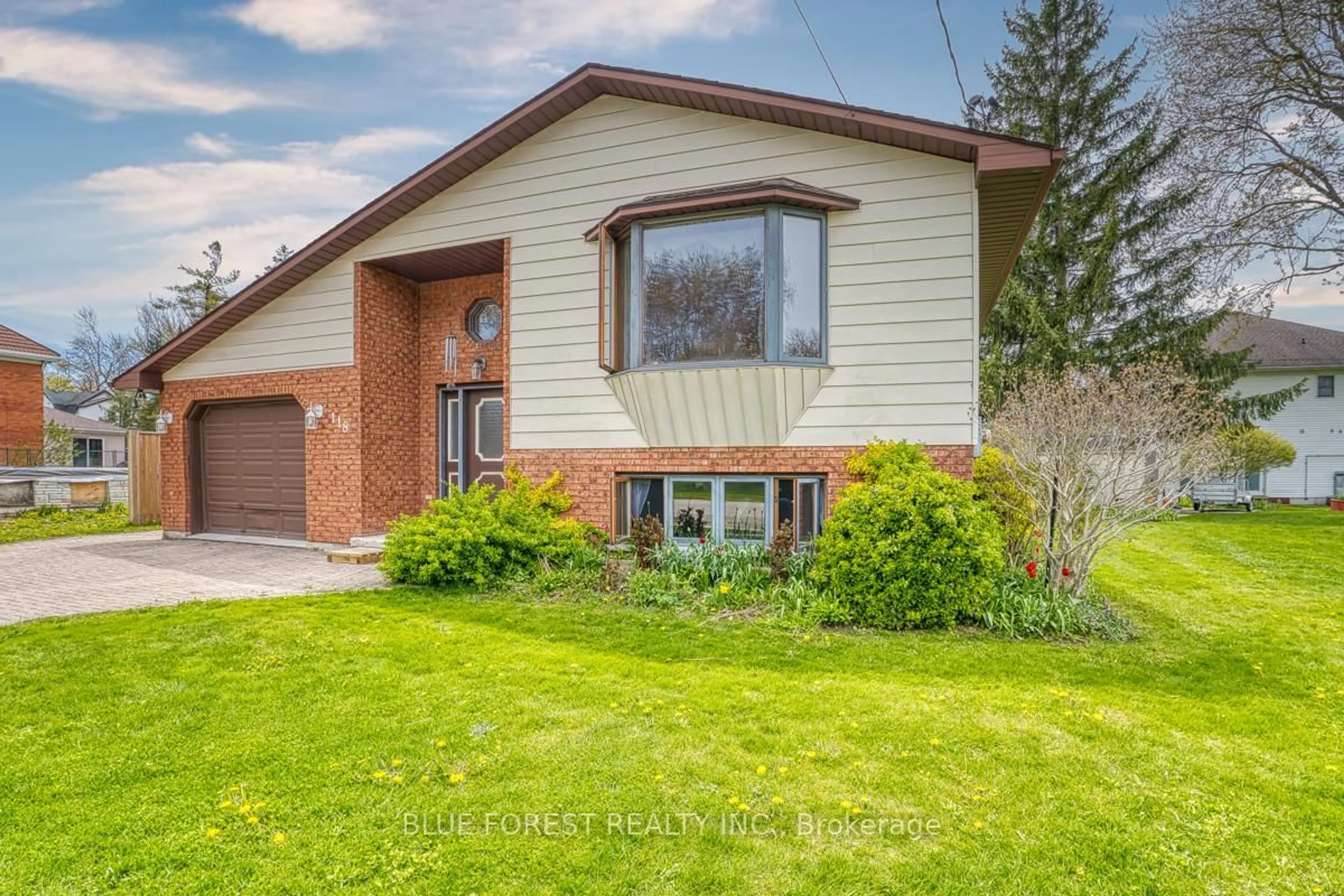 Home with vinyl exterior material, street for 118 Trafalgar St, West Perth Ontario N0K 1N0