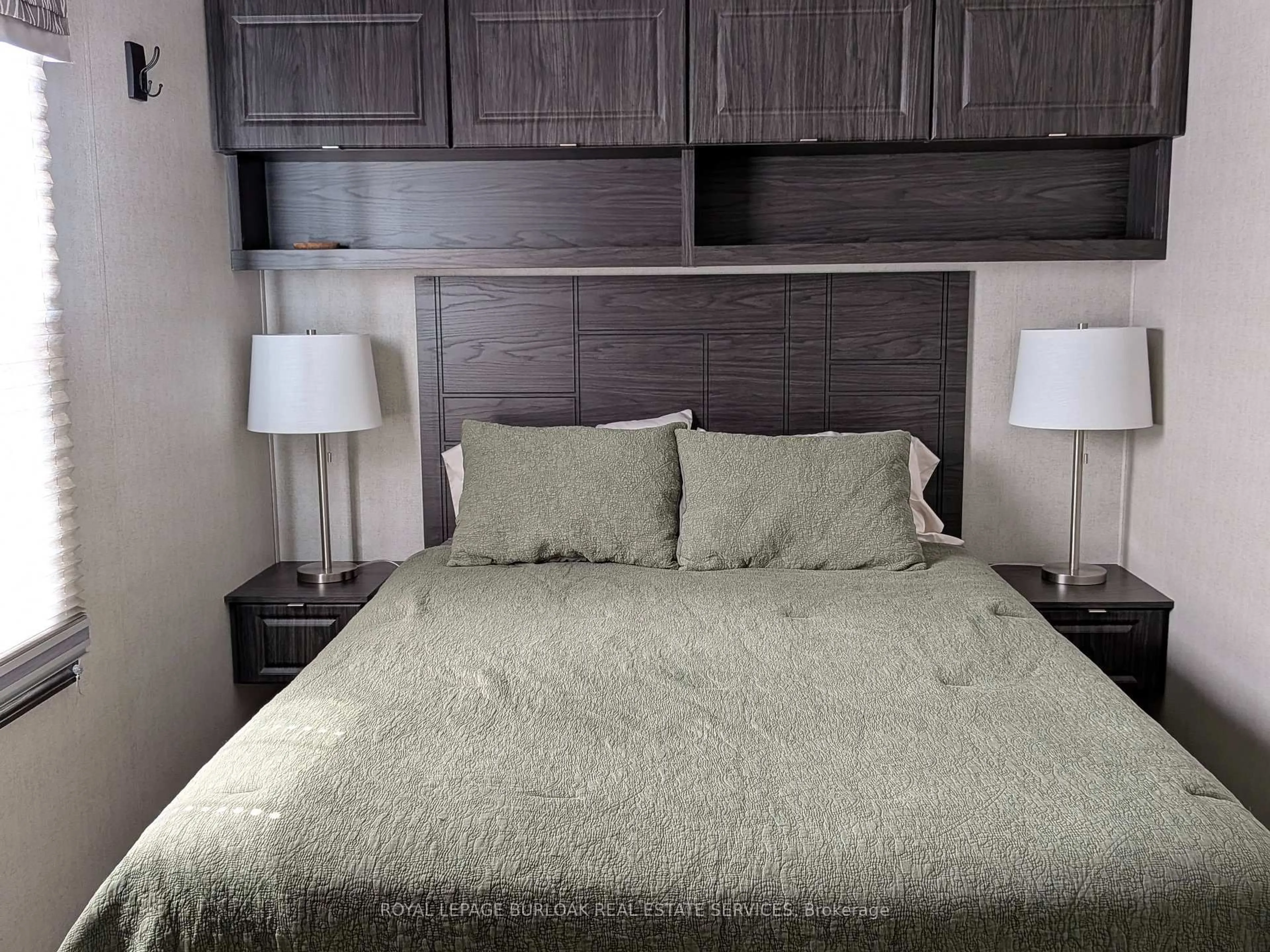 Bedroom with bed, wood/laminate floor for 1235 Villiers Line #CHYHILL054, Otonabee-South Monaghan Ontario K0L 2G0
