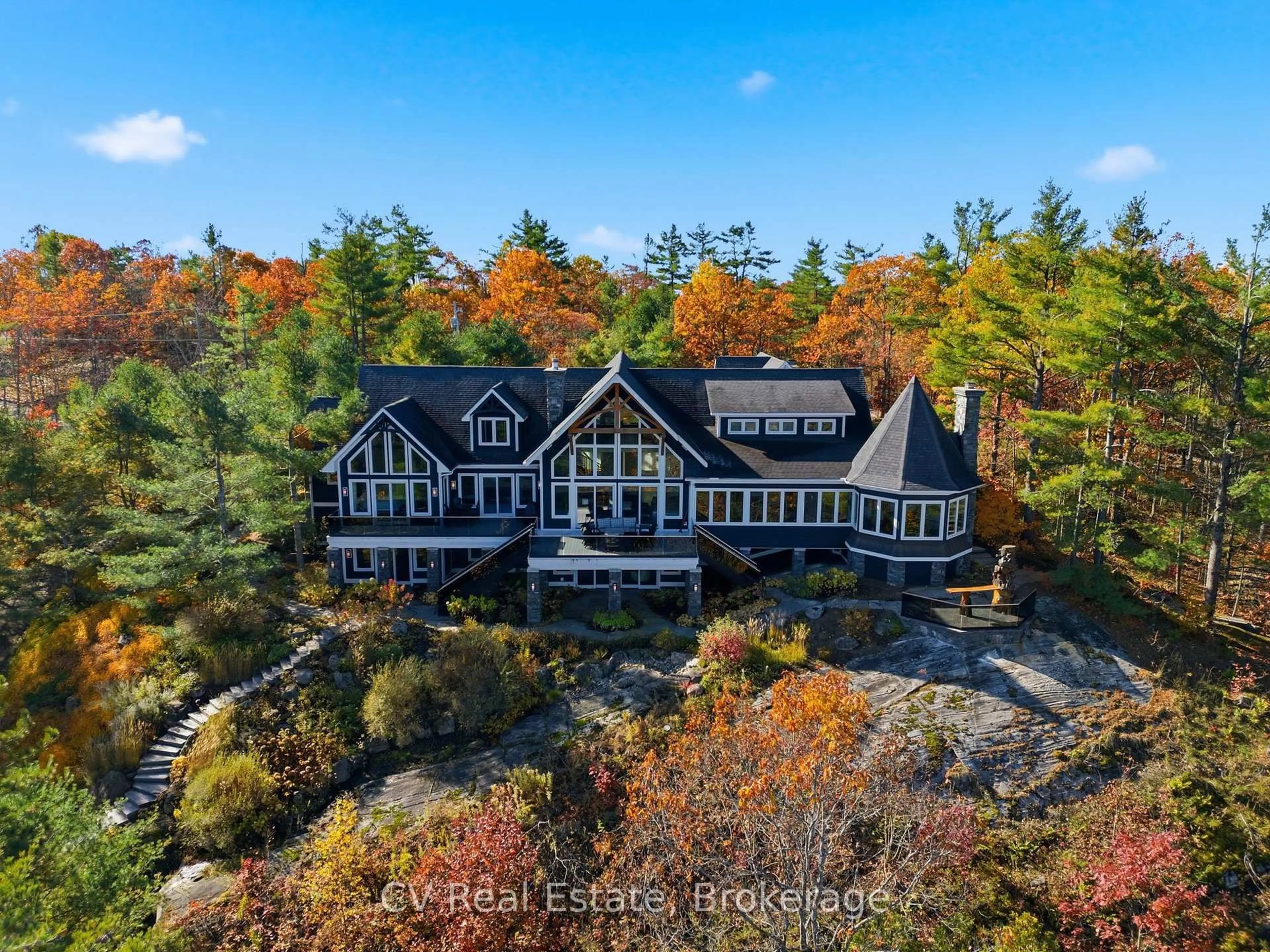 A pic from outside/outdoor area/front of a property/back of a property/a pic from drone, water/lake/river/ocean view for 1056 S Sunset Bay Rd, Gravenhurst Ontario P1P 1R2