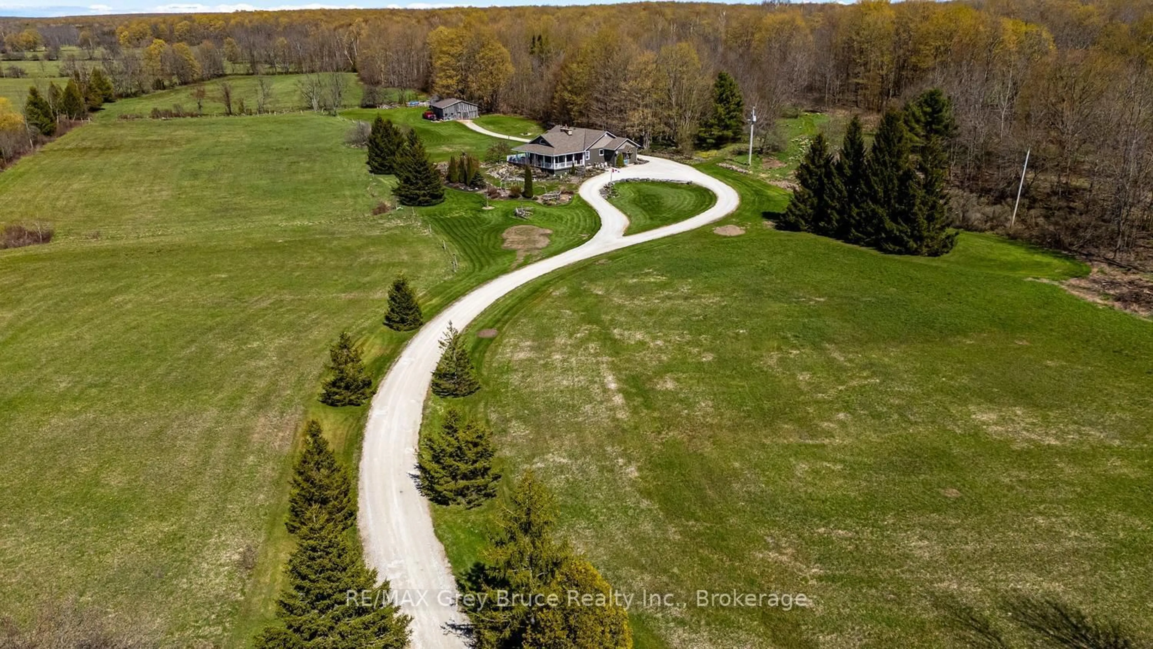 A pic from outside/outdoor area/front of a property/back of a property/a pic from drone, street for 130483 Gleason Lake Rd, Georgian Bluffs Ontario N0H 2T0