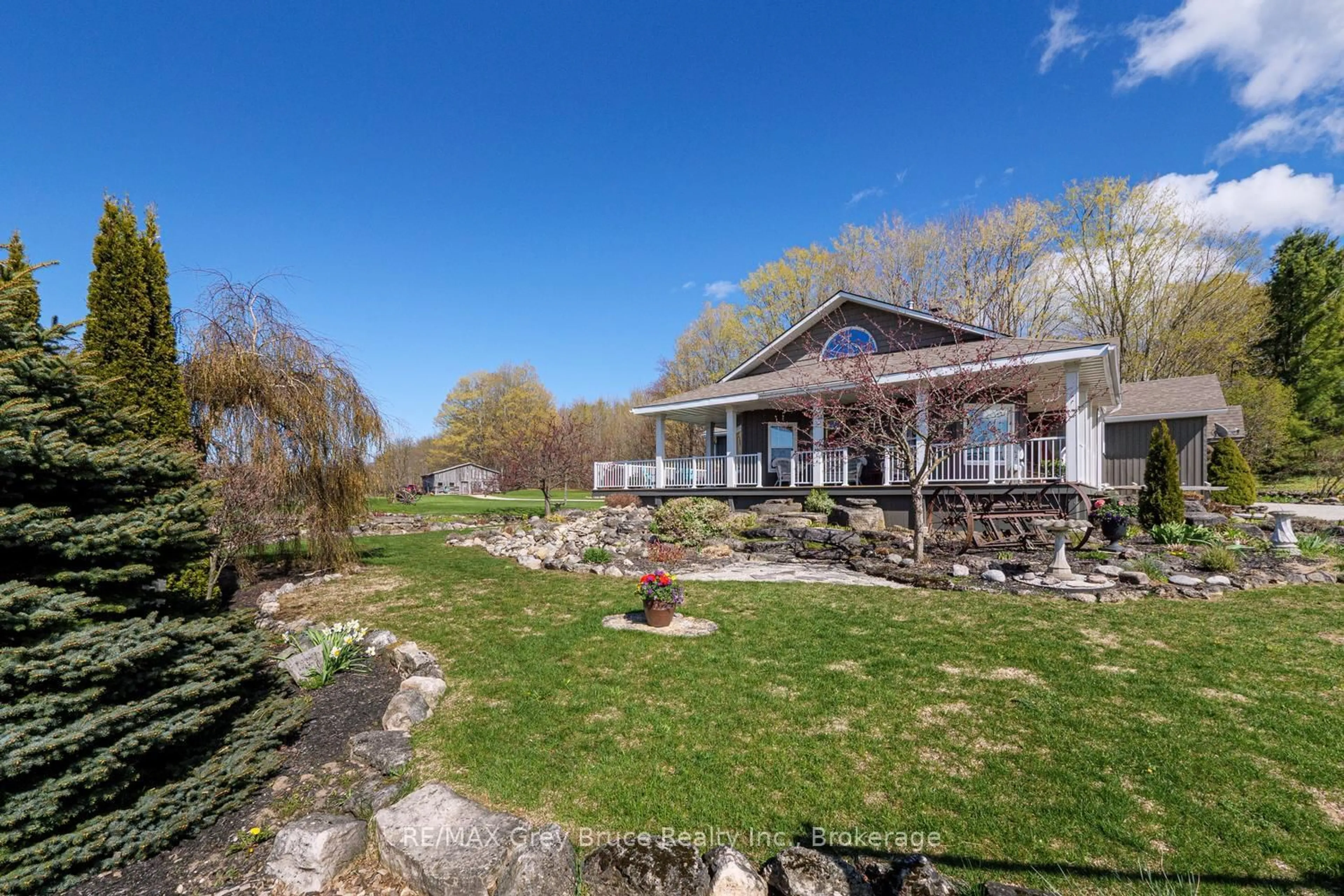 A pic from outside/outdoor area/front of a property/back of a property/a pic from drone, water/lake/river/ocean view for 130483 Gleason Lake Rd, Georgian Bluffs Ontario N0H 2T0