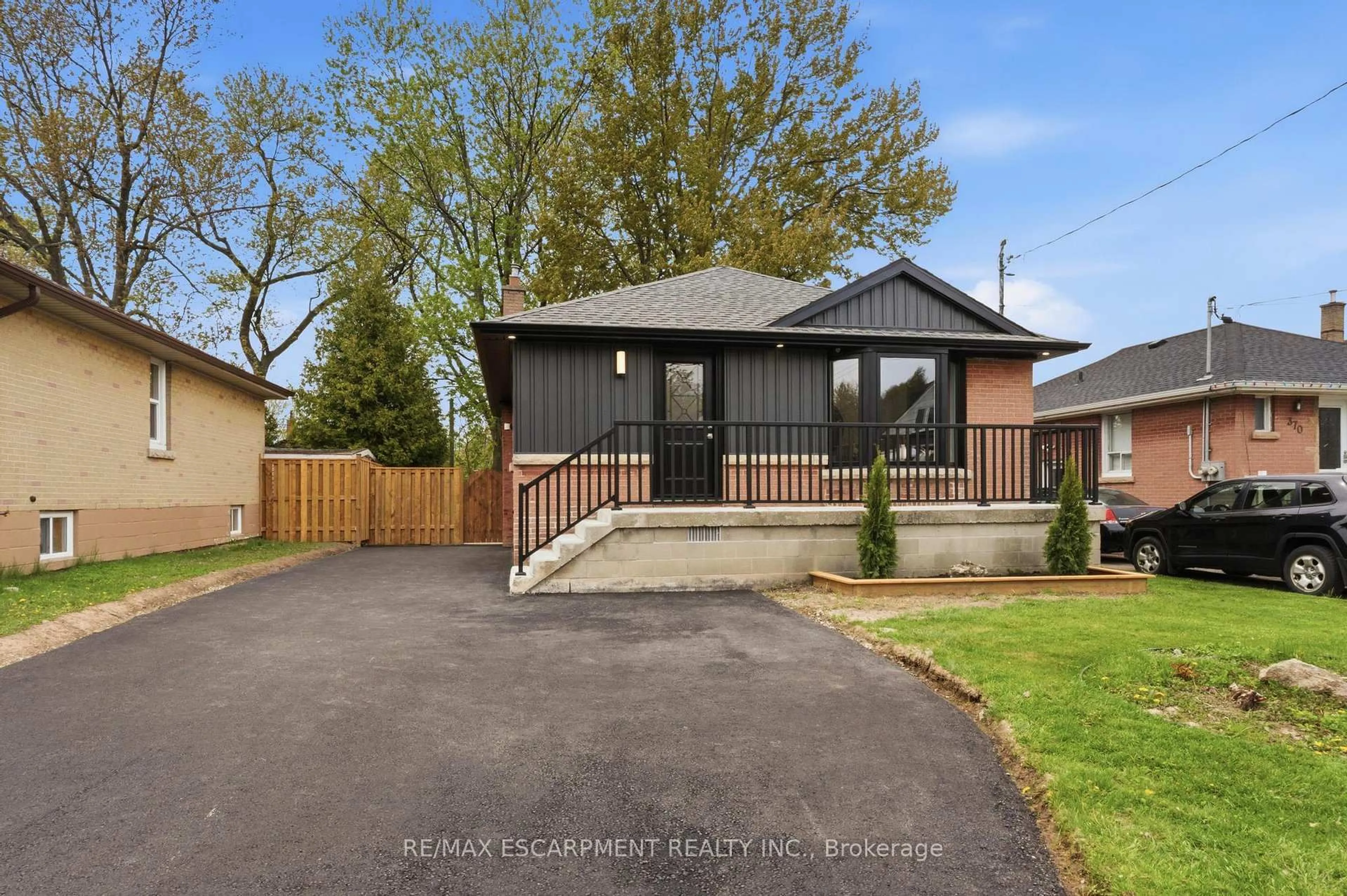 Home with brick exterior material, street for 374 East 13th St, Hamilton Ontario L9A 4A1