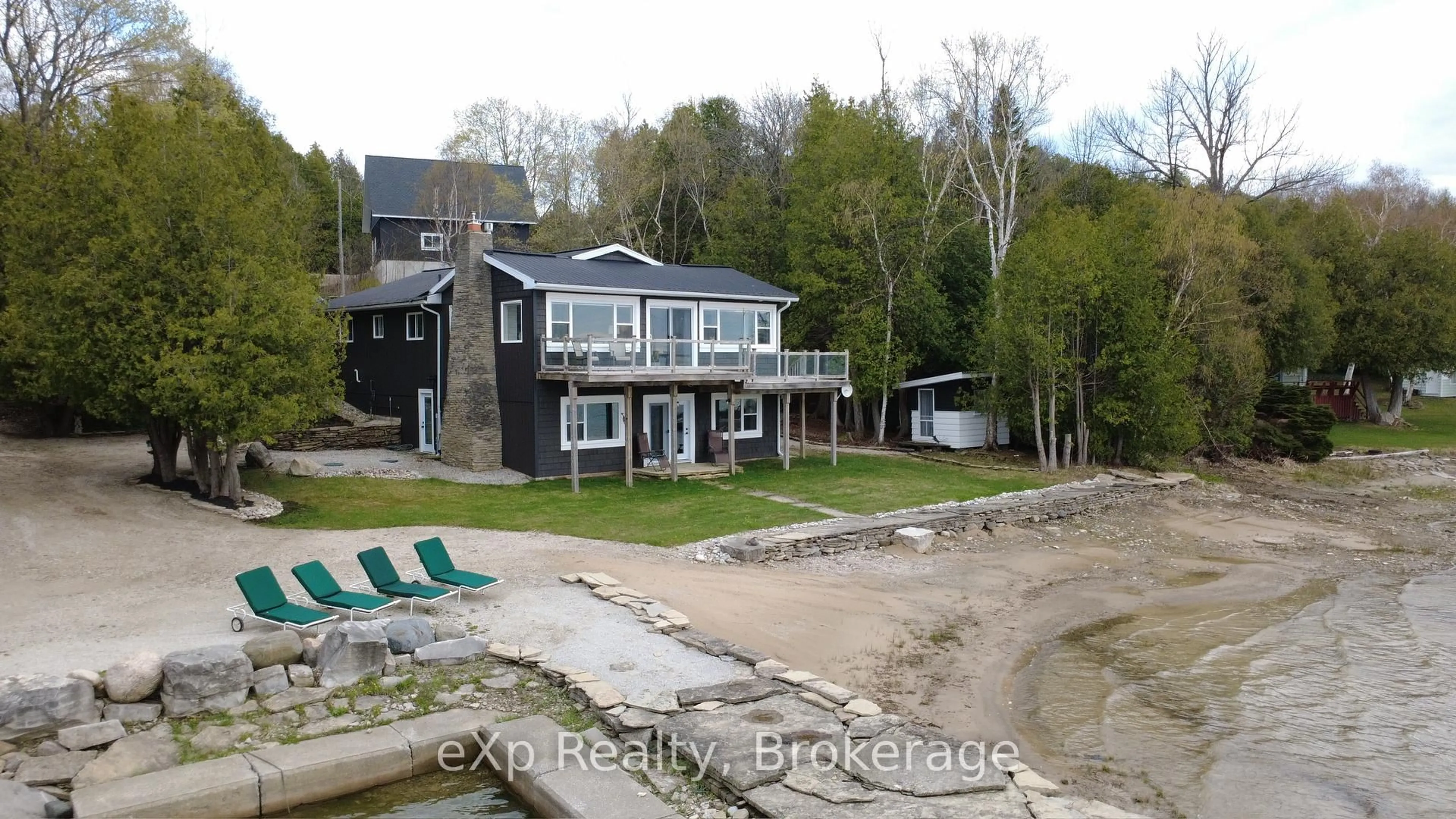A pic from outside/outdoor area/front of a property/back of a property/a pic from drone, water/lake/river/ocean view for 502453 GREY ROAD 1, Georgian Bluffs Ontario N0H 2T0