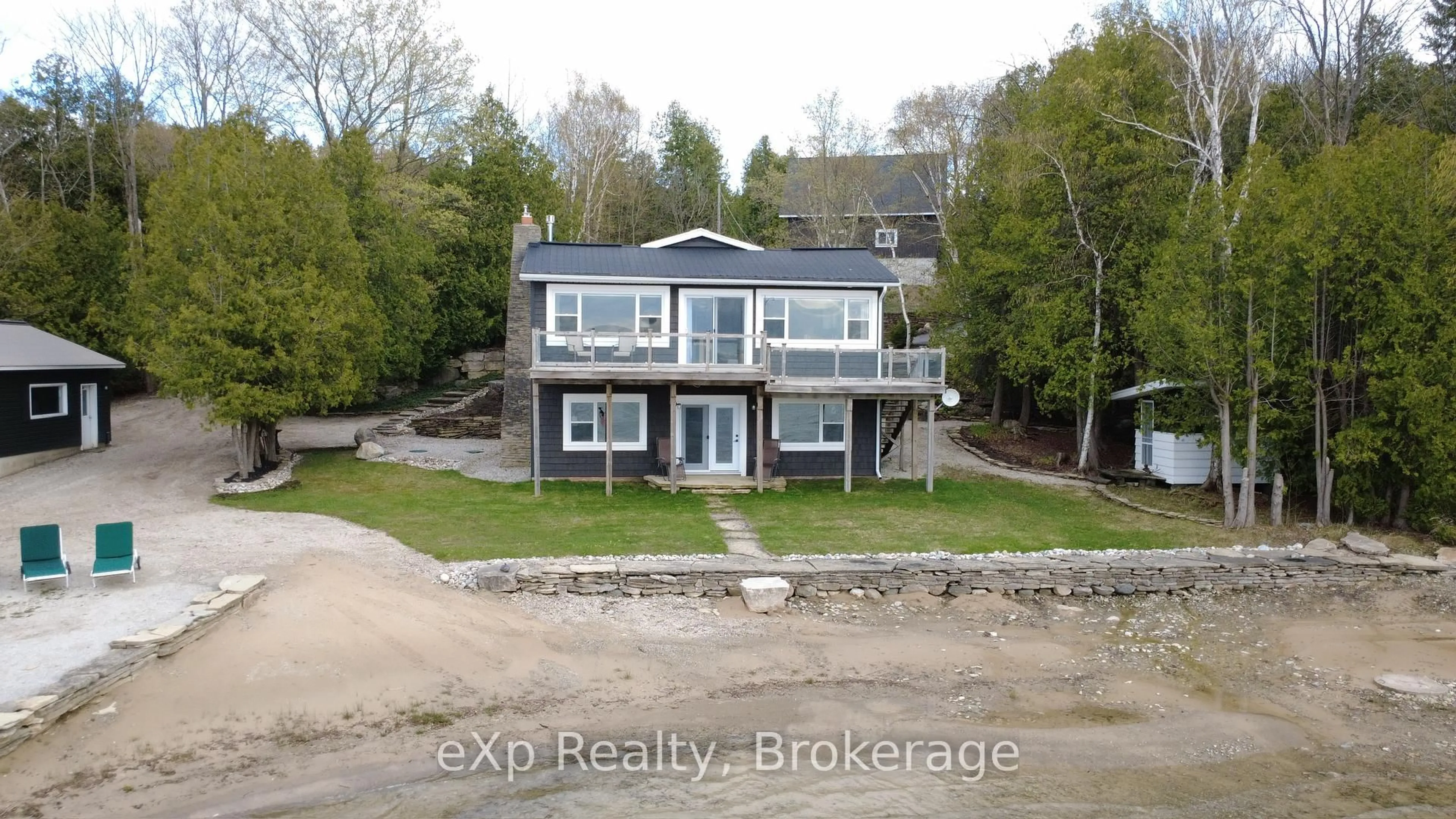 A pic from outside/outdoor area/front of a property/back of a property/a pic from drone, water/lake/river/ocean view for 502453 GREY ROAD 1, Georgian Bluffs Ontario N0H 2T0