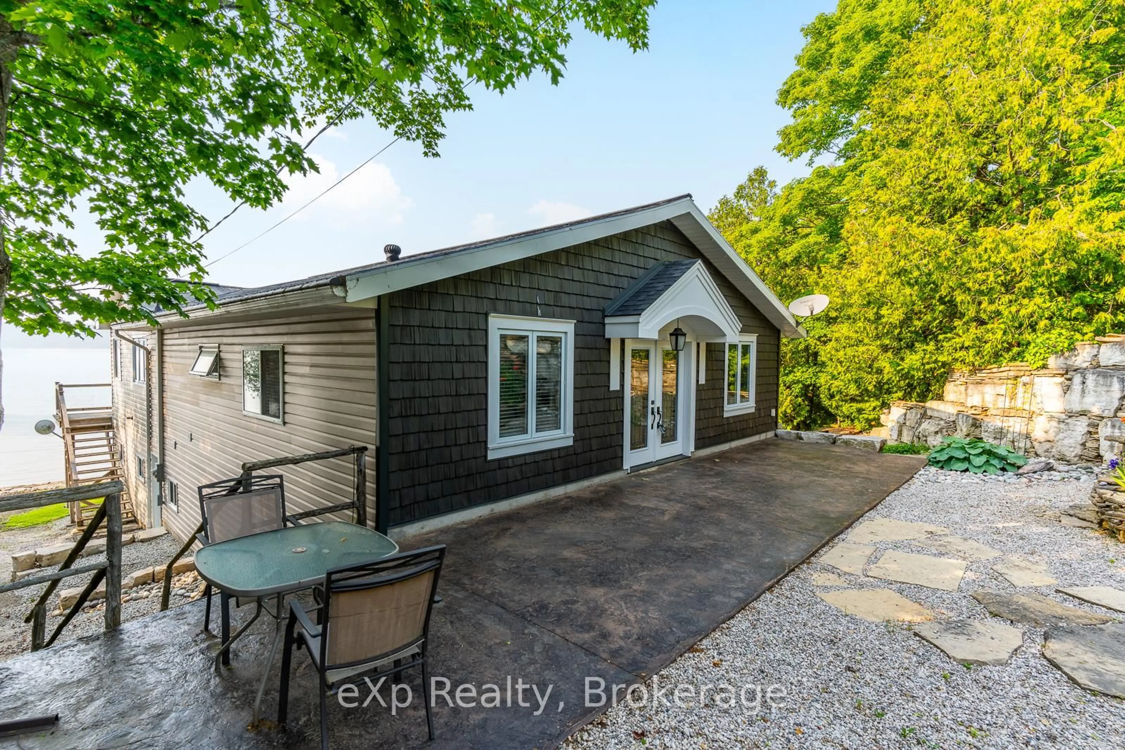 A pic from outside/outdoor area/front of a property/back of a property/a pic from drone, unknown for 502453 GREY ROAD 1, Georgian Bluffs Ontario N0H 2T0