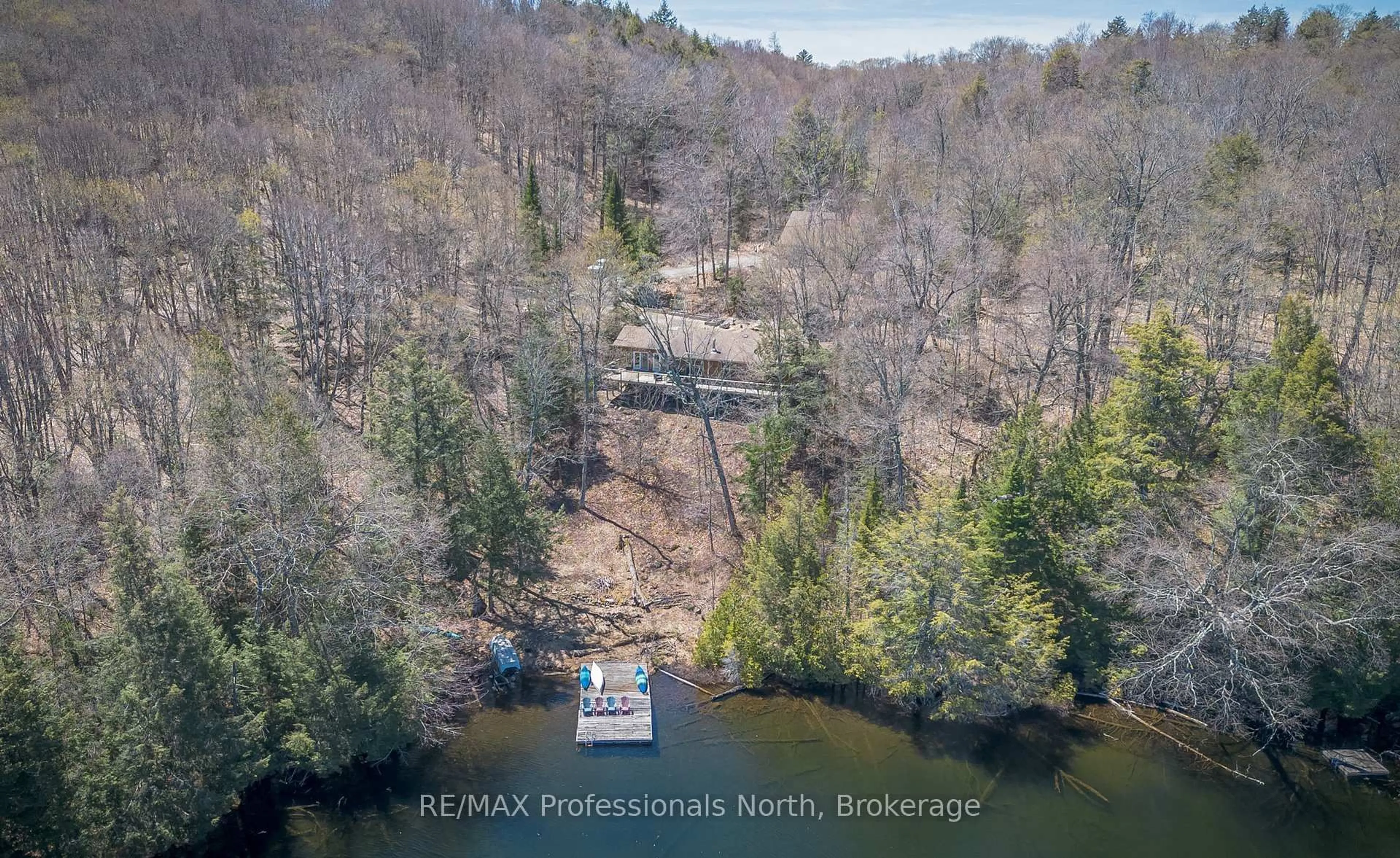 A pic from outside/outdoor area/front of a property/back of a property/a pic from drone, water/lake/river/ocean view for 1113 Crobiel Lake Dr, Algonquin Highlands Ontario P0A 1E0