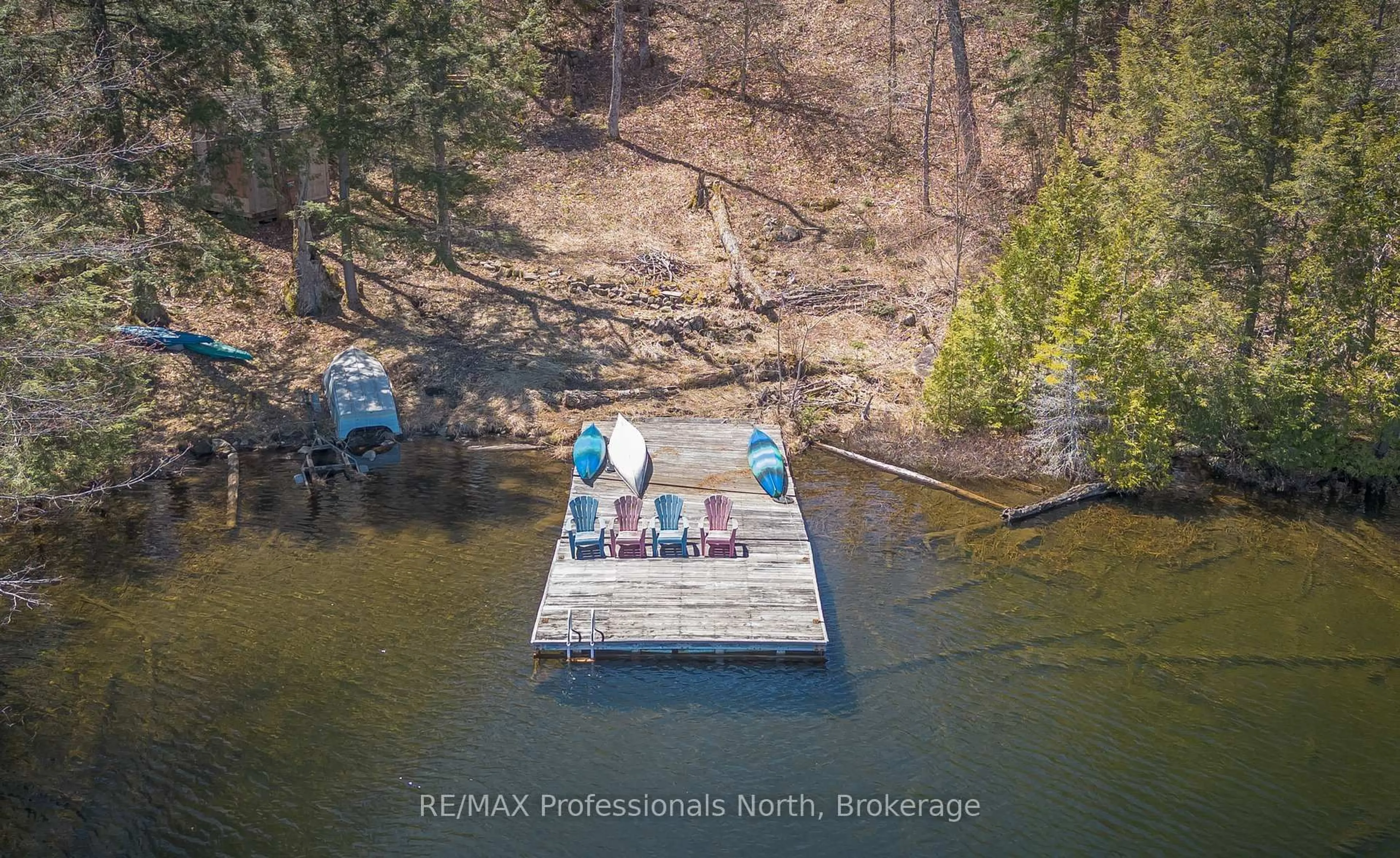 A pic from outside/outdoor area/front of a property/back of a property/a pic from drone, water/lake/river/ocean view for 1113 Crobiel Lake Dr, Algonquin Highlands Ontario P0A 1E0