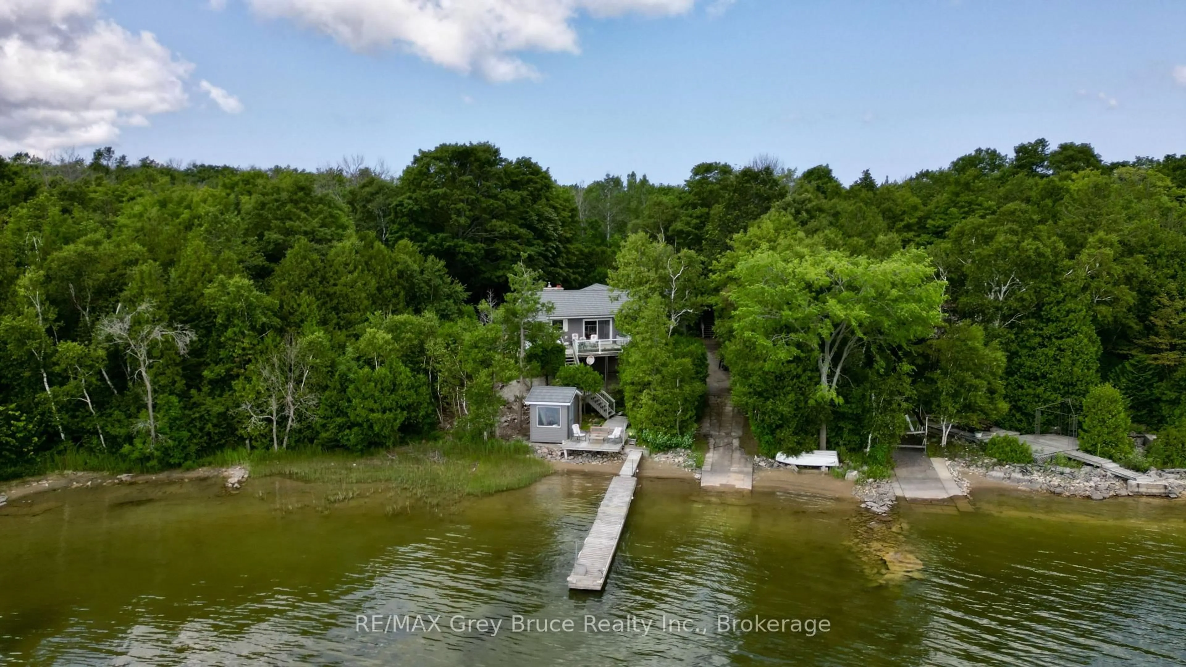 A pic from outside/outdoor area/front of a property/back of a property/a pic from drone, water/lake/river/ocean view for 340 Barney's Blvd, Northern Bruce Peninsula Ontario N0H 1Z0