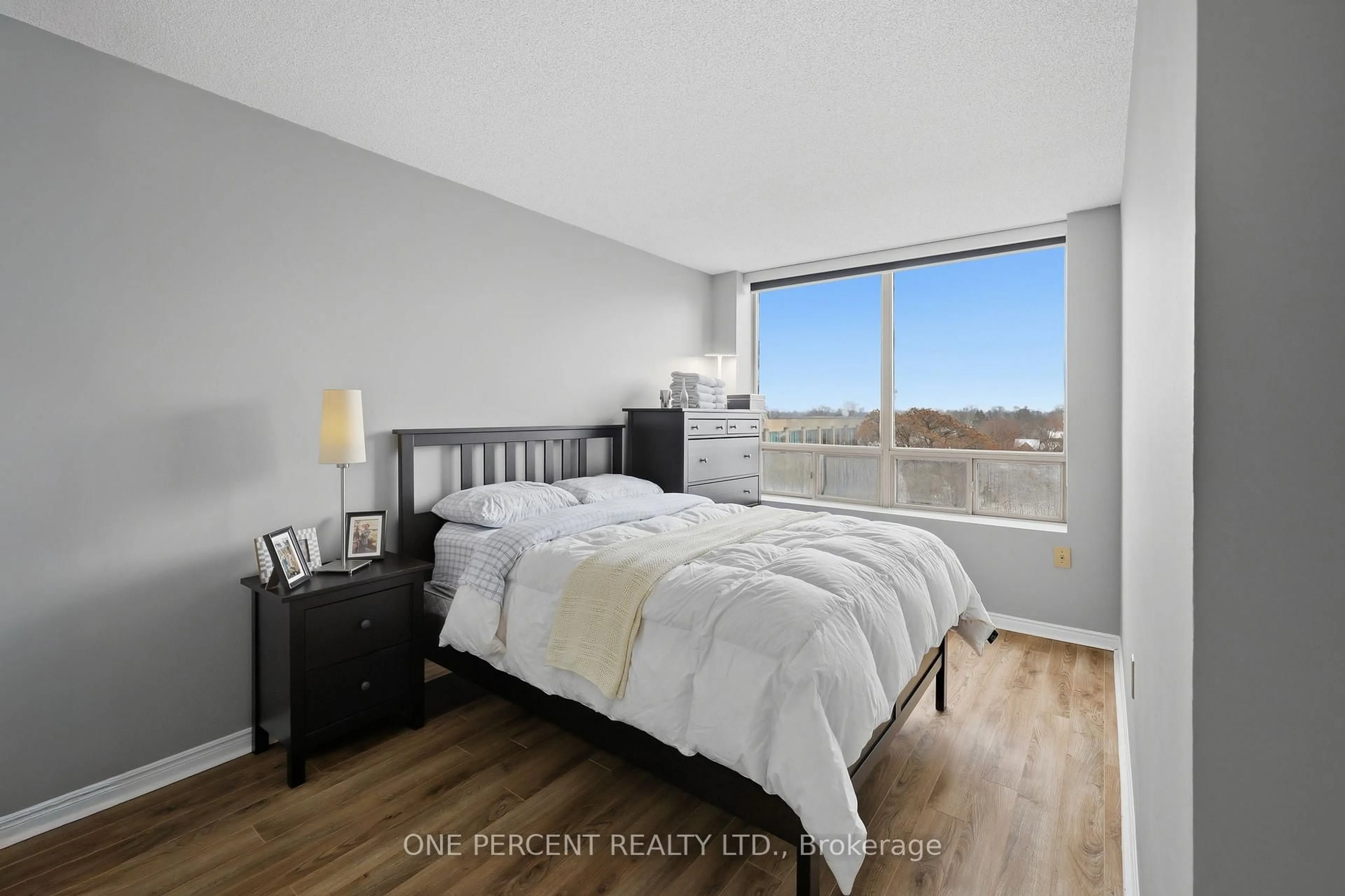 Bedroom with bed, wood/laminate floor for 695 Richmond St #709, London East Ontario N6A 5M8