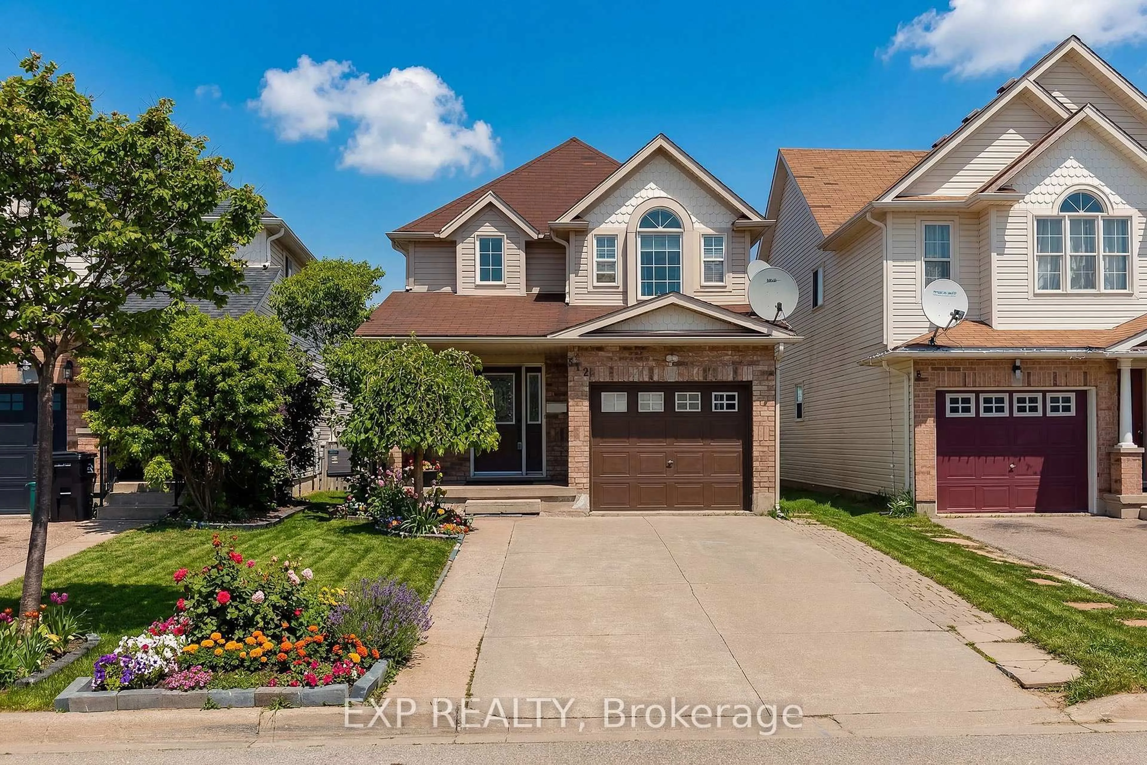 Home with brick exterior material, street for 512 Snowdrop Crt, Kitchener Ontario N2E 4G4