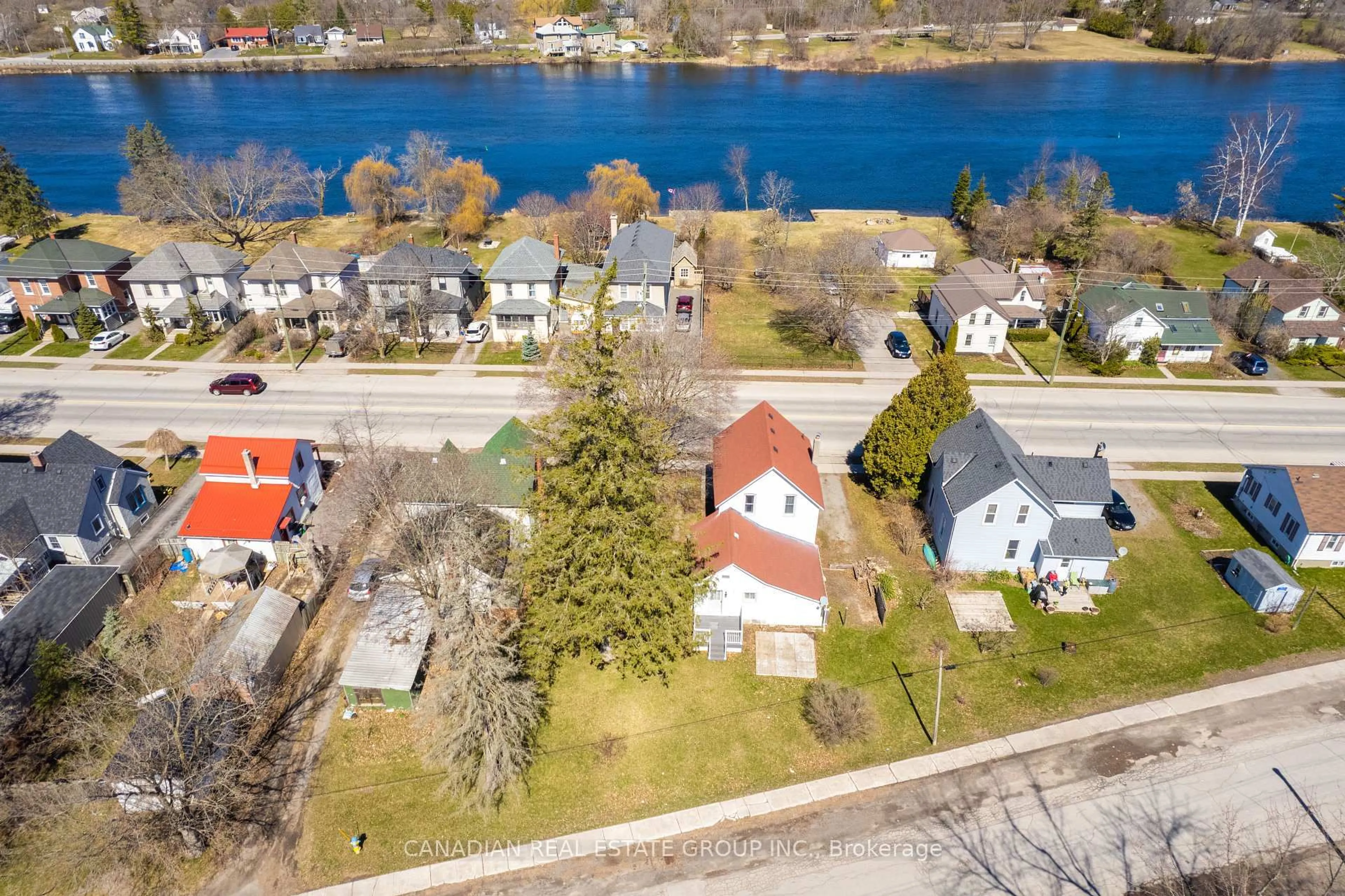 A pic from outside/outdoor area/front of a property/back of a property/a pic from drone, water/lake/river/ocean view for 207 Front St, Trent Hills Ontario K0L 1L0
