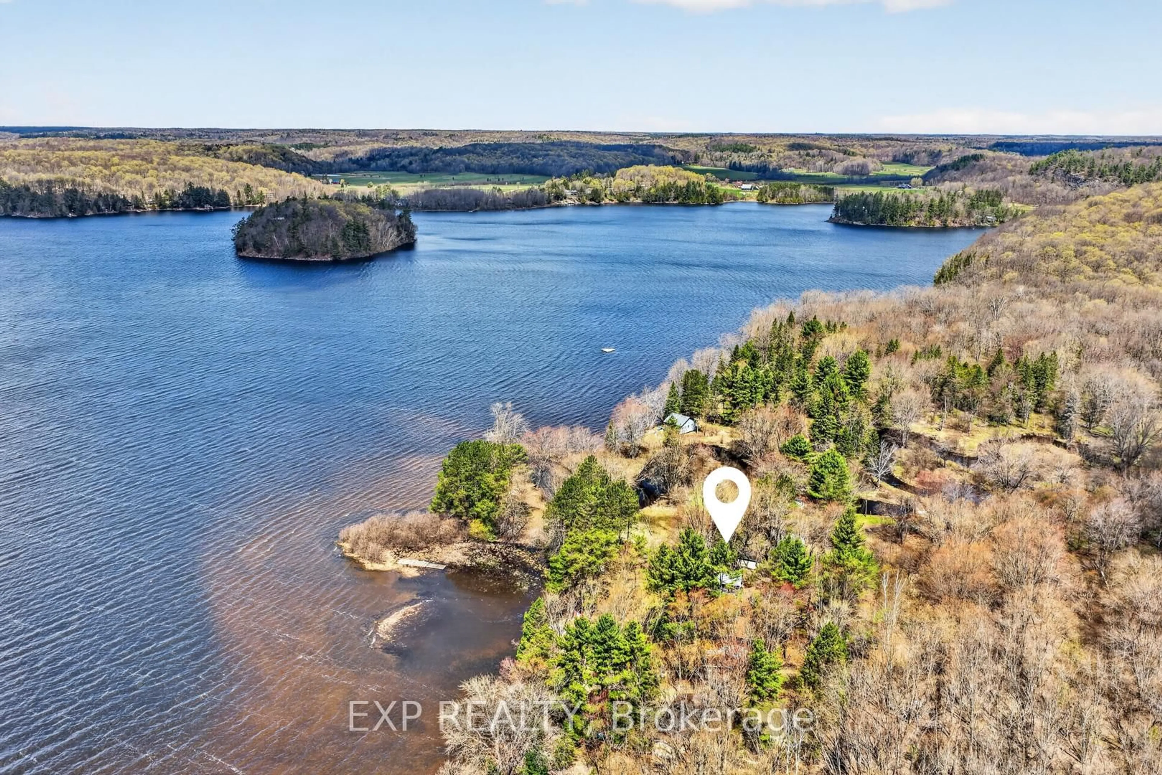 A pic from outside/outdoor area/front of a property/back of a property/a pic from drone, water/lake/river/ocean view for 1039 Wonder Beach Rd, Muskoka Lakes Ontario P0B 1M0
