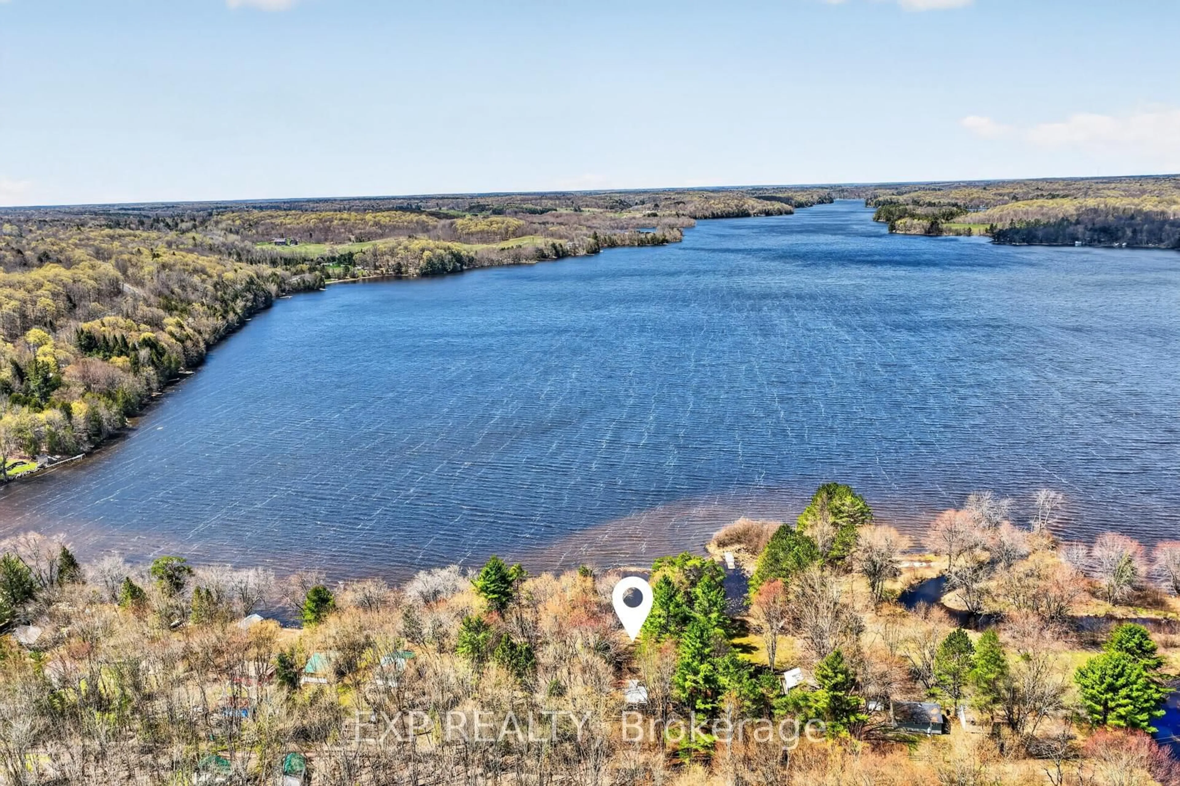A pic from outside/outdoor area/front of a property/back of a property/a pic from drone, water/lake/river/ocean view for 1039 Wonder Beach Rd, Muskoka Lakes Ontario P0B 1M0