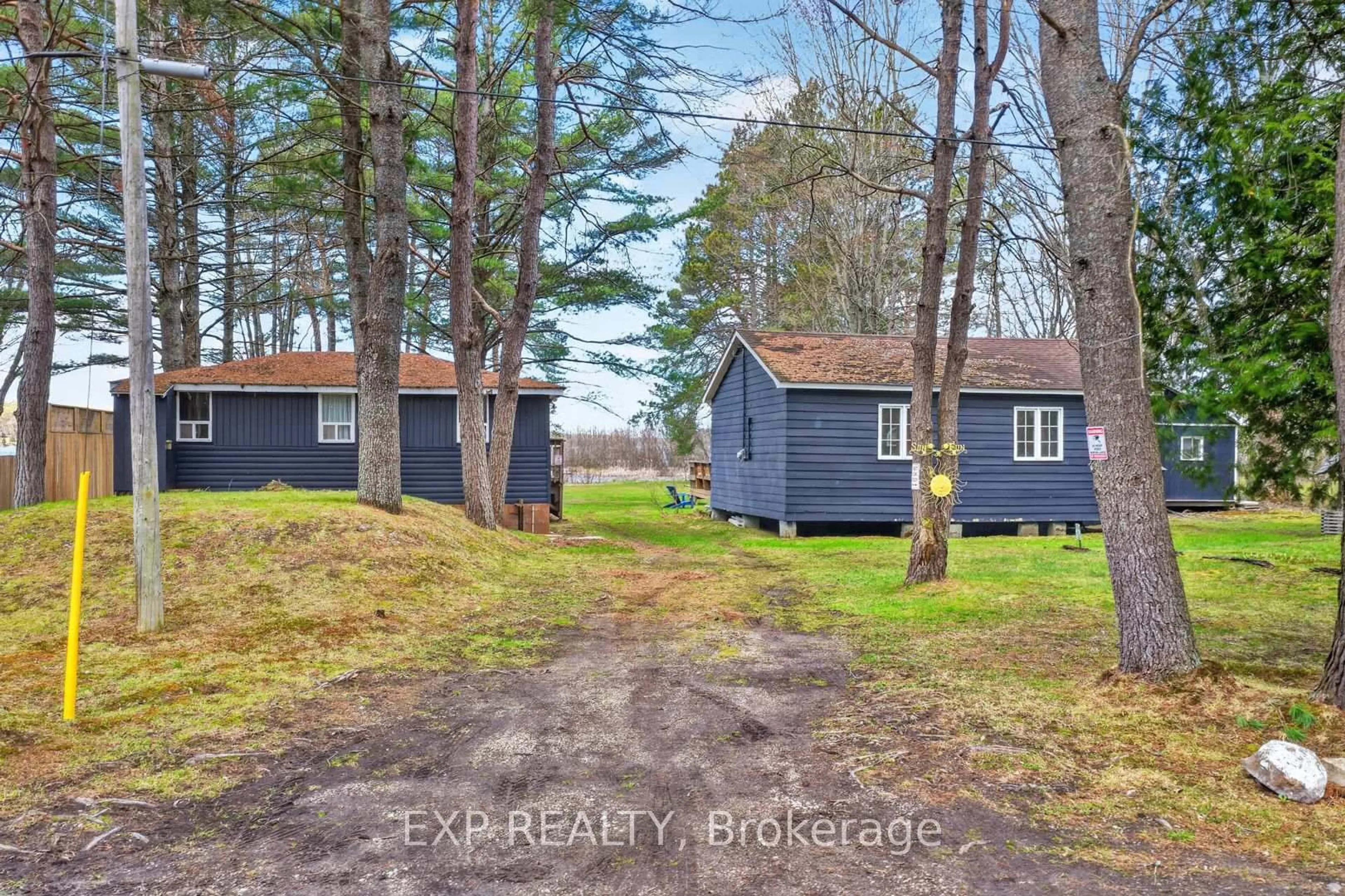 A pic from outside/outdoor area/front of a property/back of a property/a pic from drone, unknown for 1039 Wonder Beach Rd, Muskoka Lakes Ontario P0B 1M0