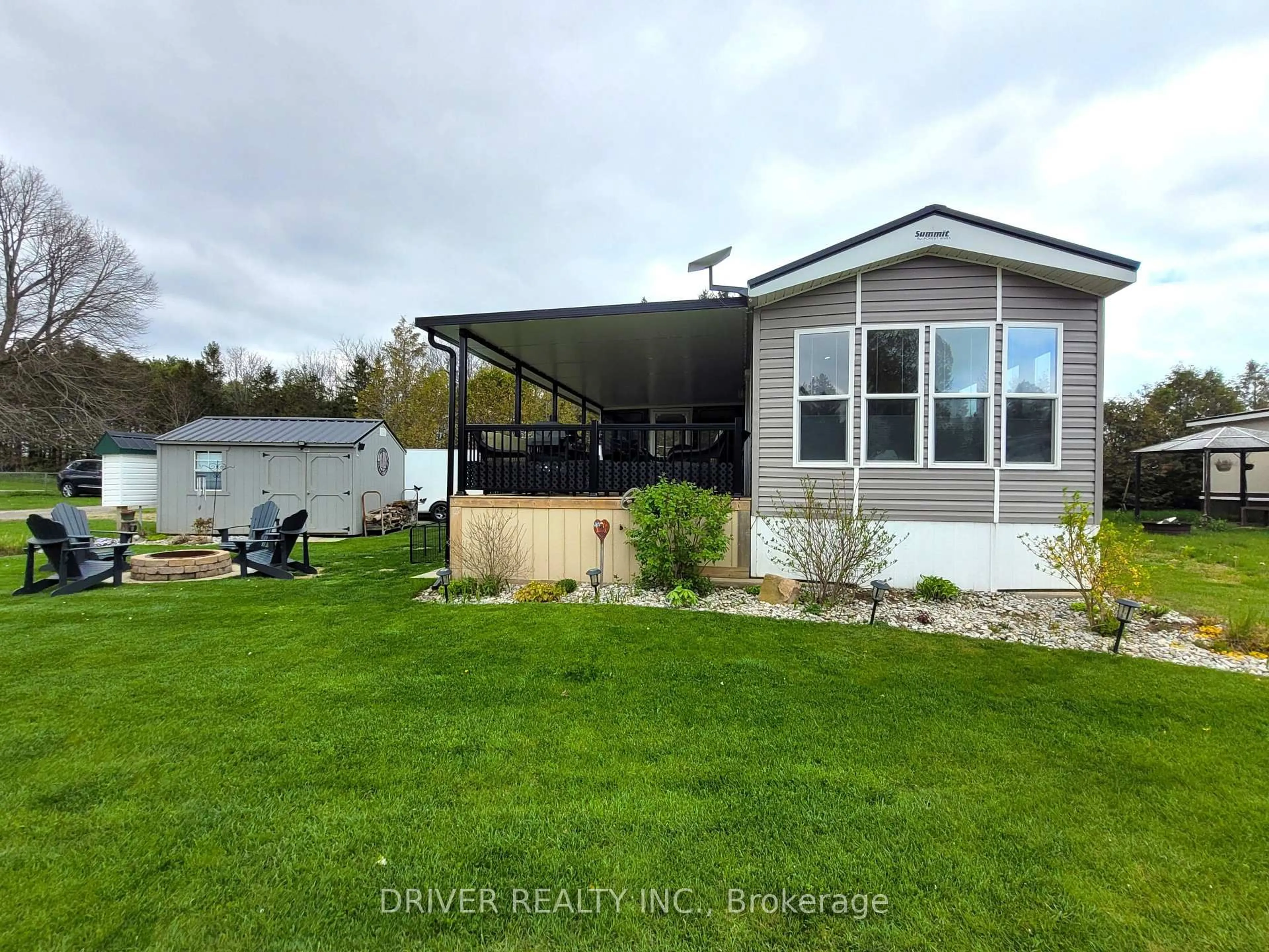 A pic from outside/outdoor area/front of a property/back of a property/a pic from drone, water/lake/river/ocean view for 930 Lakeshore Rd #89, Norfolk Ontario N0J 1T0