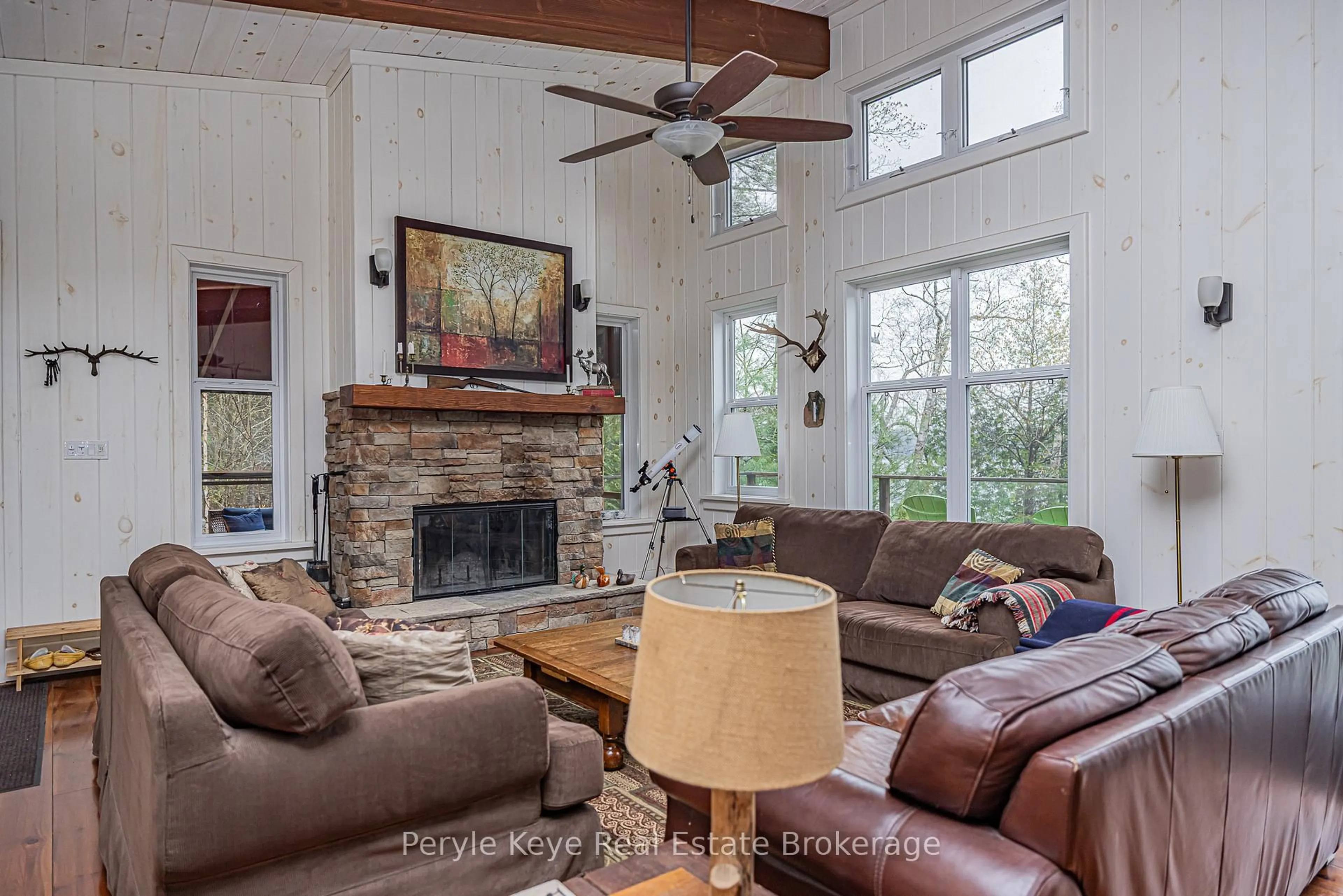 Living room with furniture, unknown for 1127 Whispering Pines Tr, Bracebridge Ontario P0H 0A9