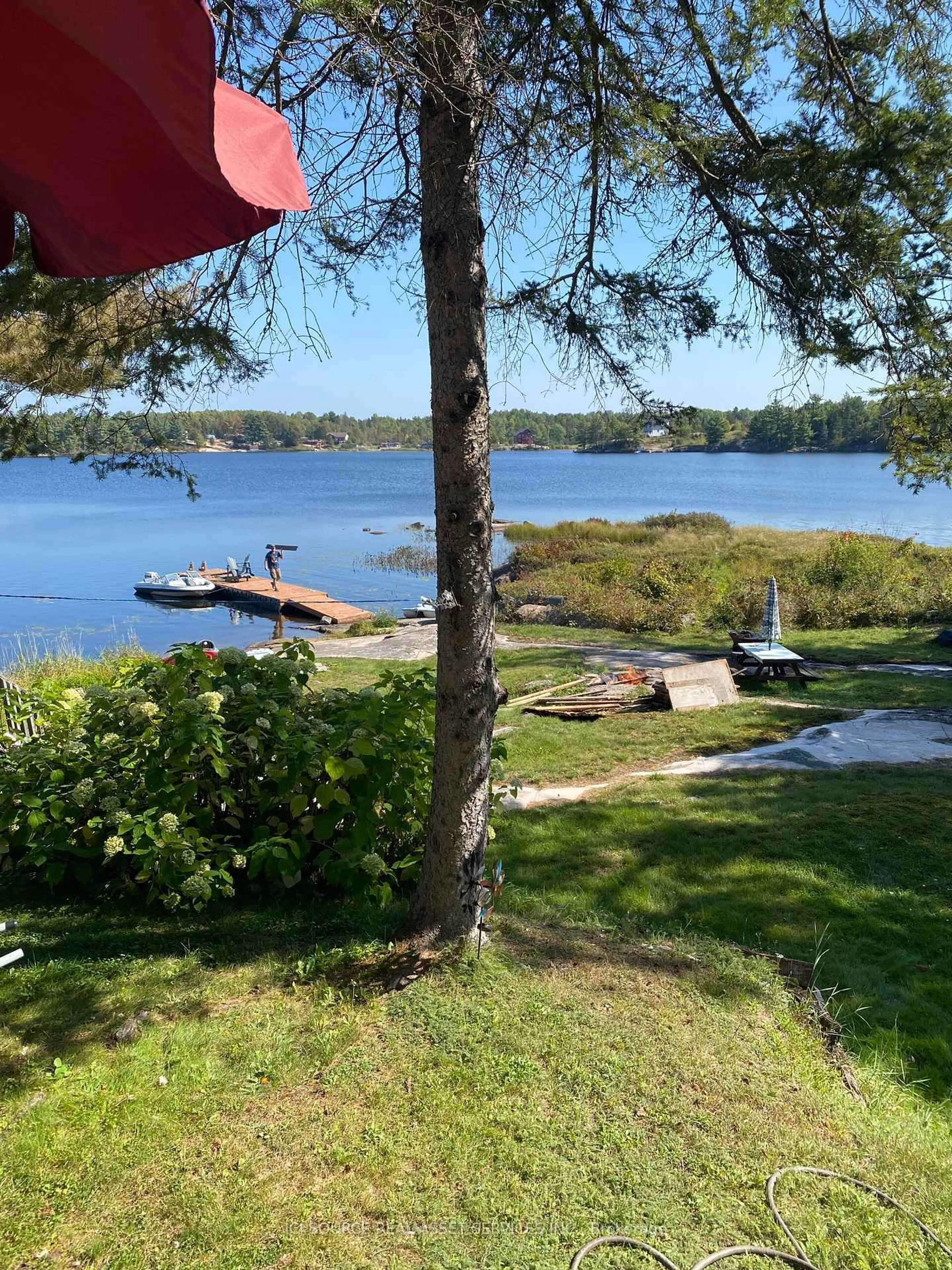 A pic from outside/outdoor area/front of a property/back of a property/a pic from drone, water/lake/river/ocean view for 42 West Ham Lake Rd, Killarney Ontario P0M 1A0