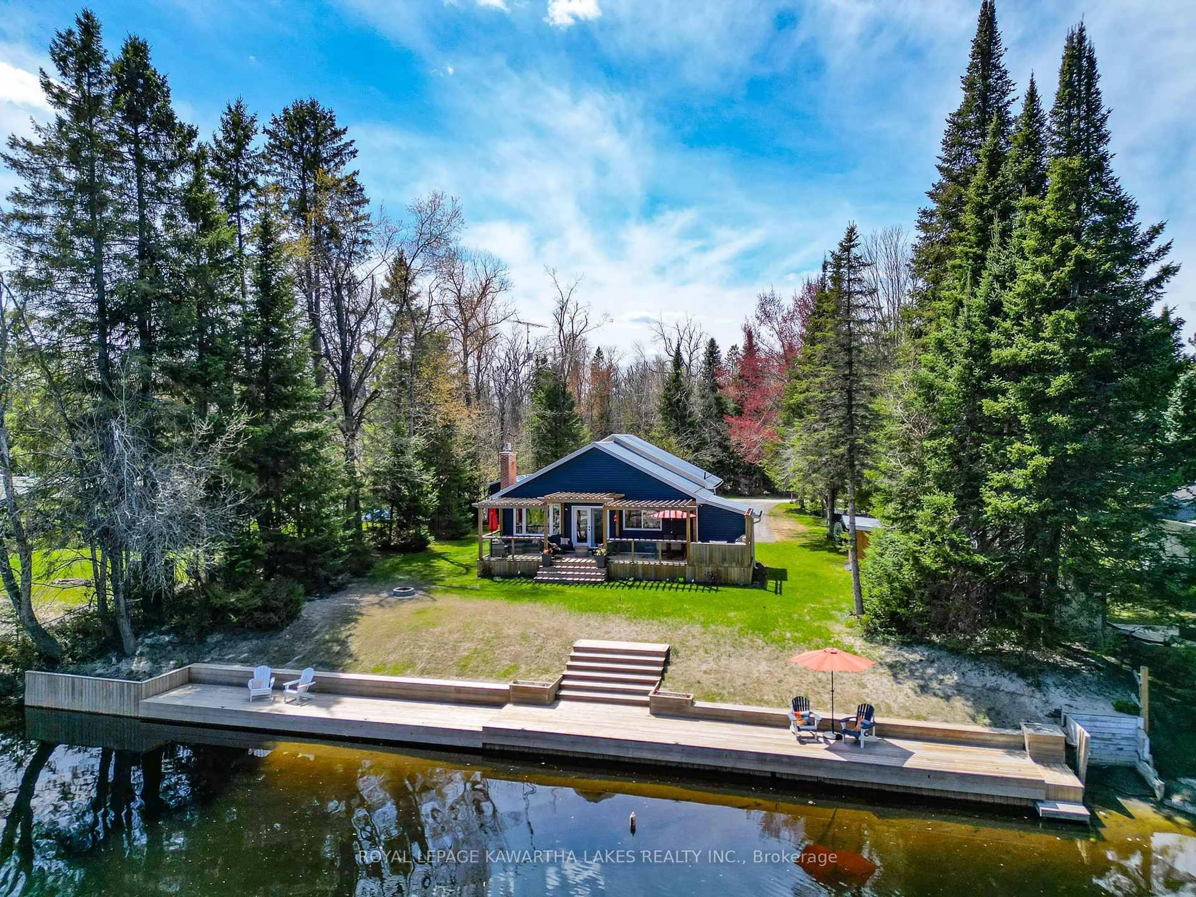 A pic from outside/outdoor area/front of a property/back of a property/a pic from drone, water/lake/river/ocean view for 54 Riverbank Rd, Kawartha Lakes Ontario K0M 1N0
