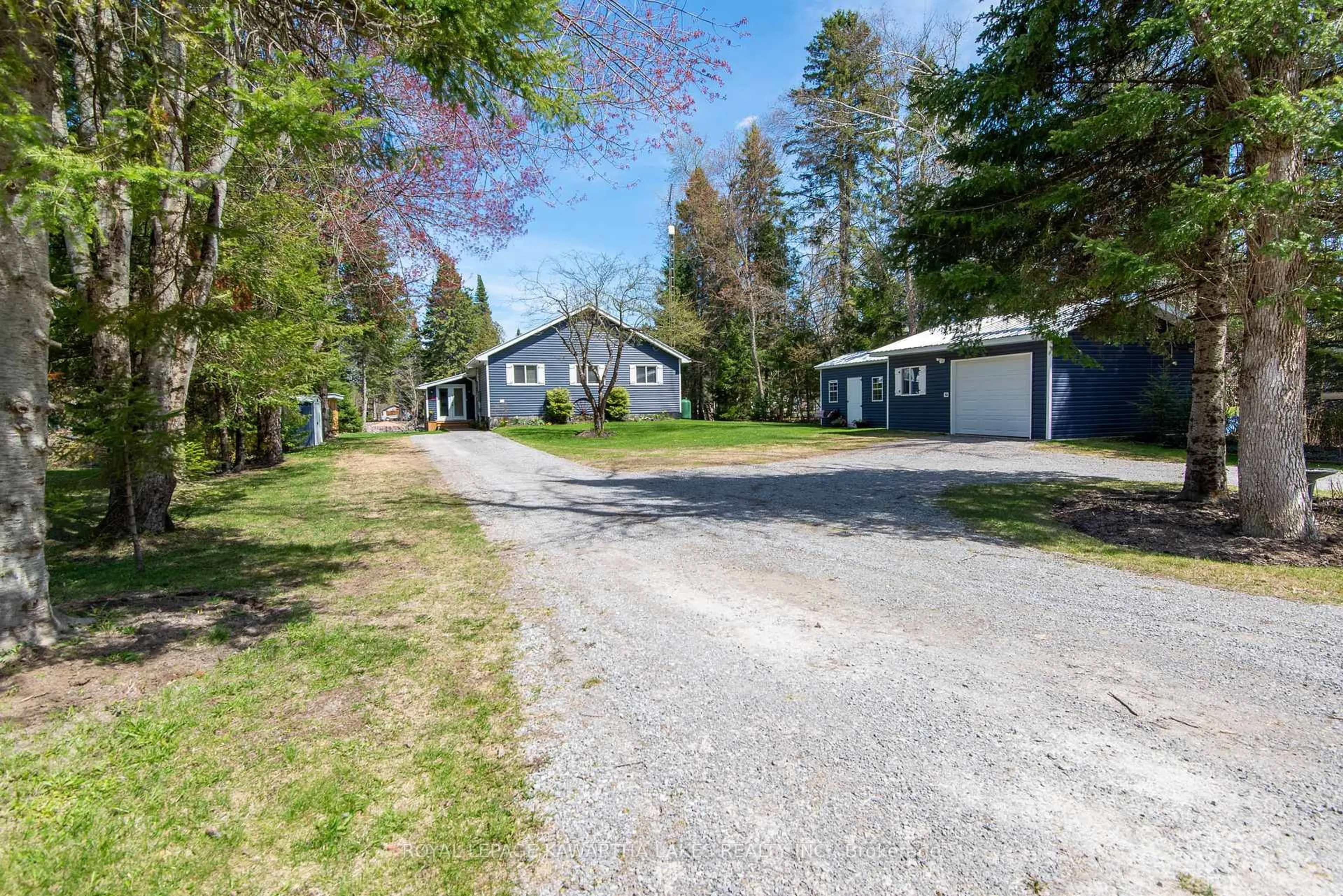 A pic from outside/outdoor area/front of a property/back of a property/a pic from drone, street for 54 Riverbank Rd, Kawartha Lakes Ontario K0M 1N0