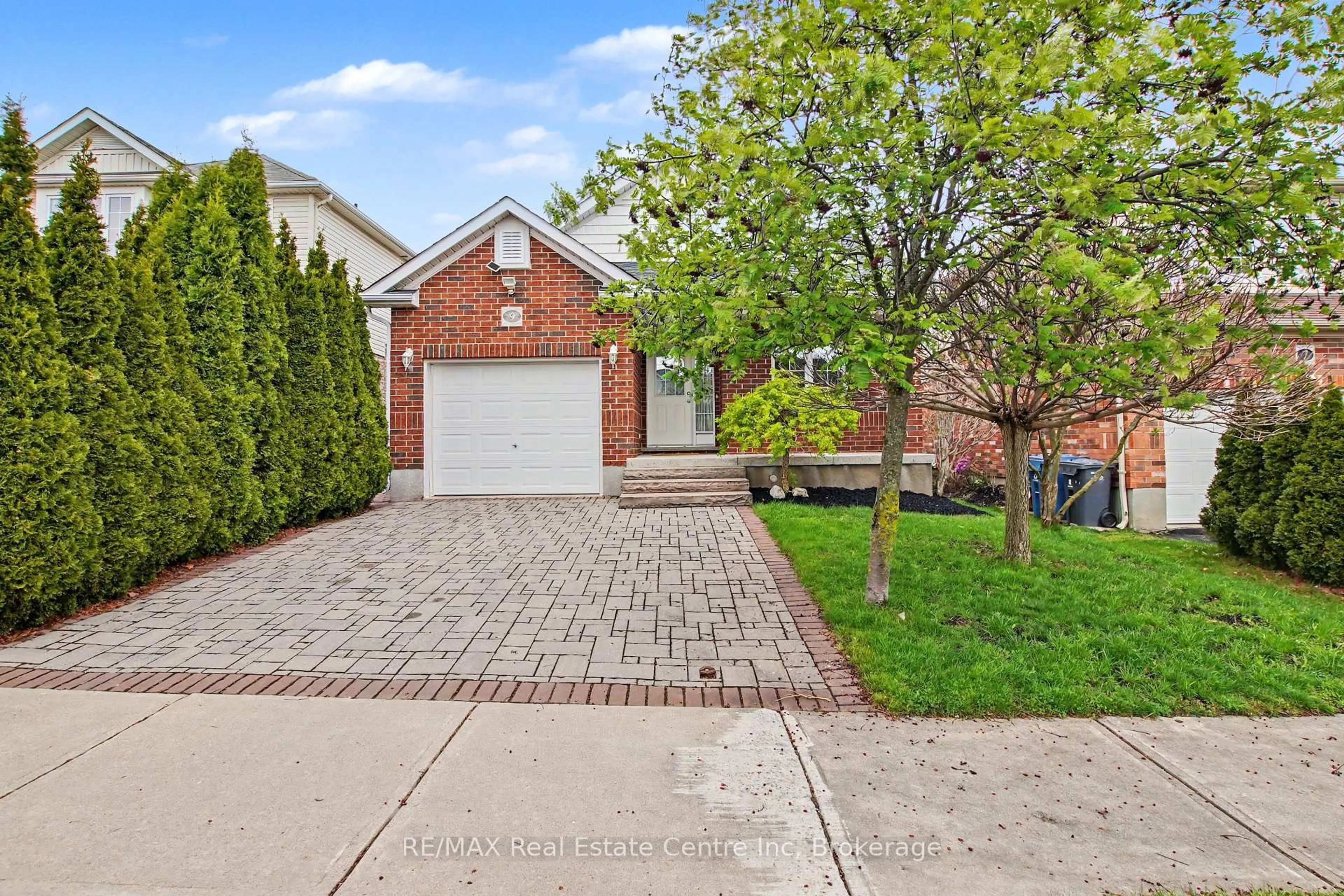 Home with brick exterior material, street for 9 Washburn Dr, Guelph Ontario N1E 0B4