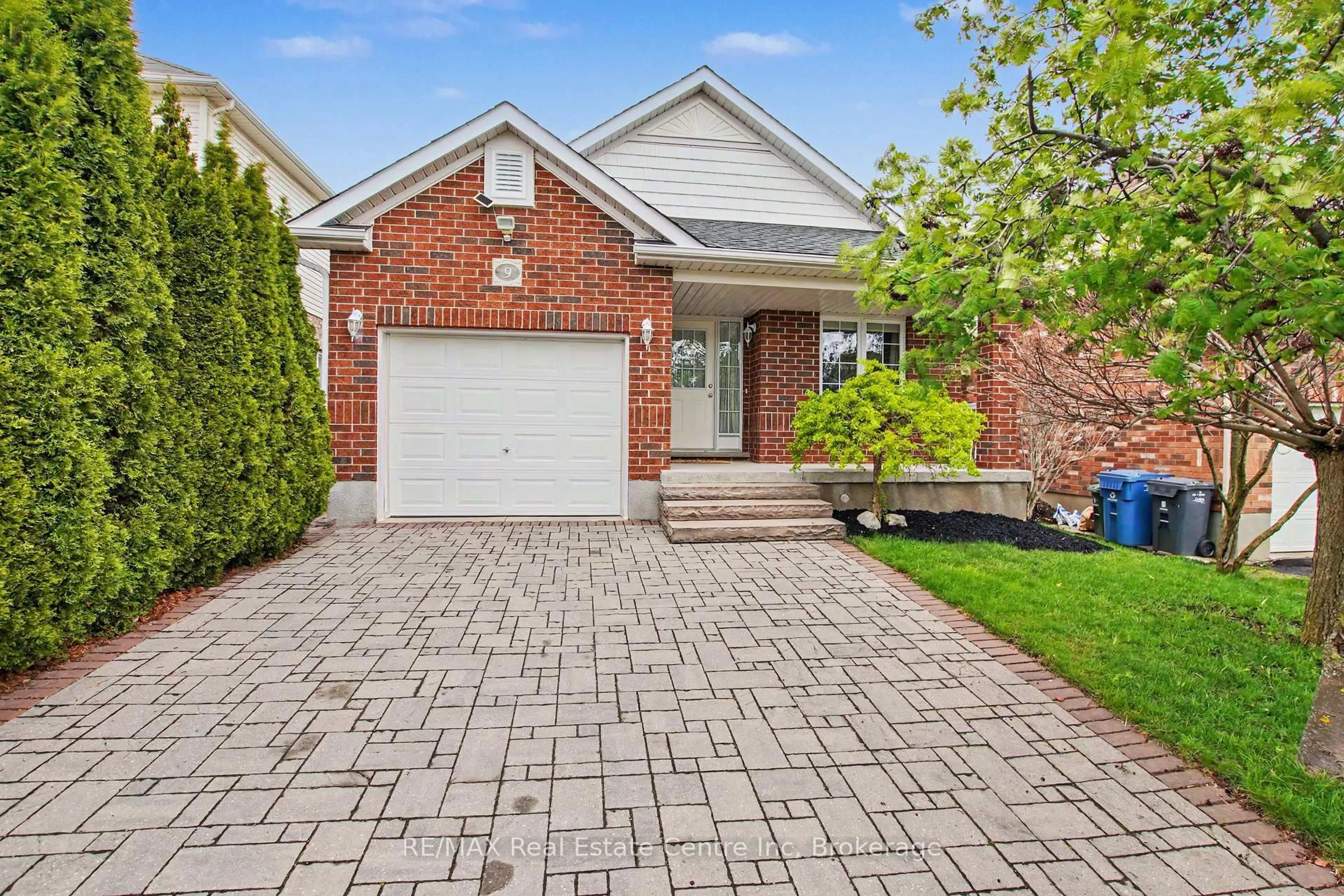 Home with brick exterior material, street for 9 Washburn Dr, Guelph Ontario N1E 0B4