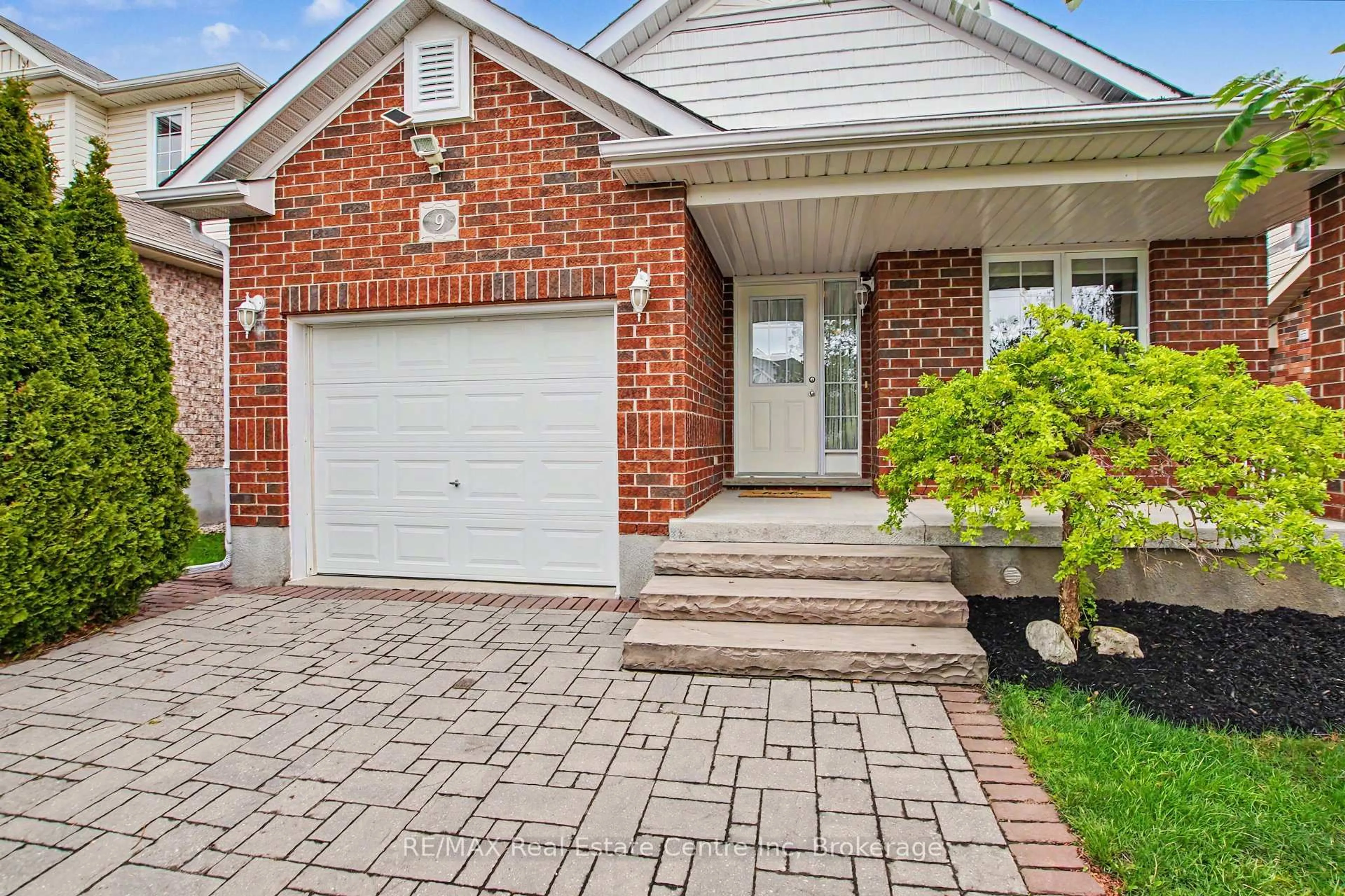 Home with brick exterior material, street for 9 Washburn Dr, Guelph Ontario N1E 0B4