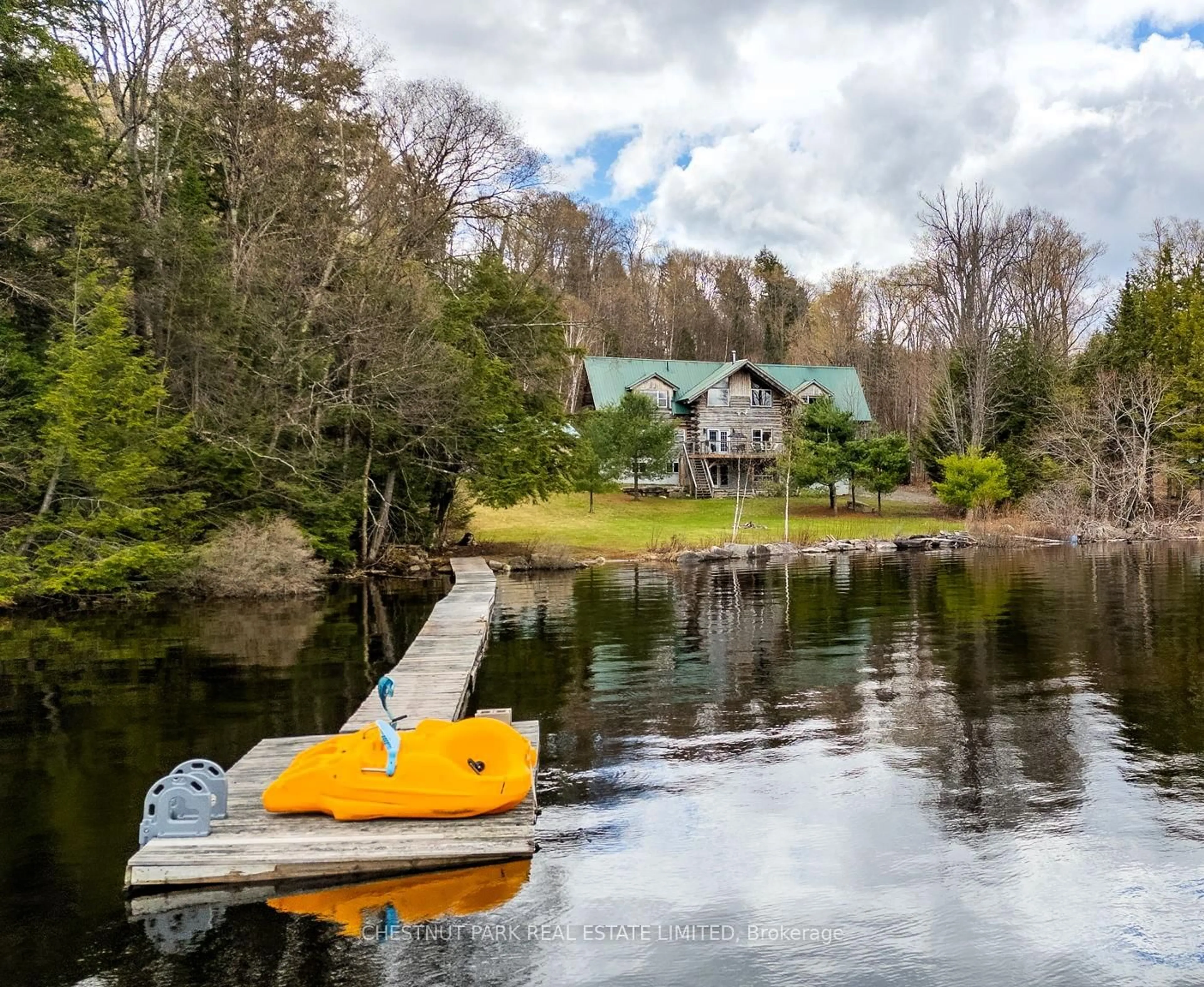 A pic from outside/outdoor area/front of a property/back of a property/a pic from drone, water/lake/river/ocean view for 1068 Rattlesnake Rd, Dysart et al Ontario K0M 1S0