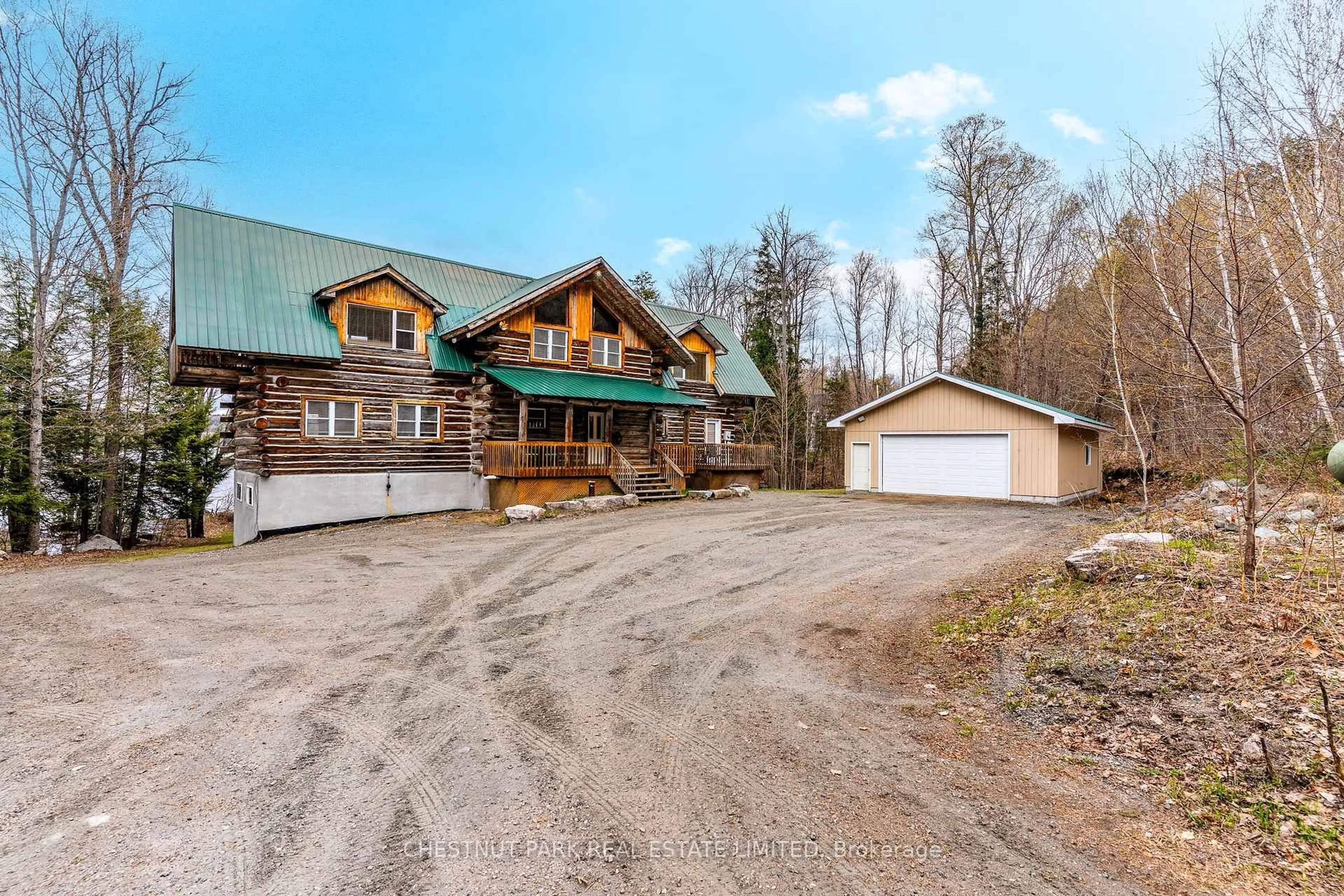 A pic from outside/outdoor area/front of a property/back of a property/a pic from drone, unknown for 1068 Rattlesnake Rd, Dysart et al Ontario K0M 1S0