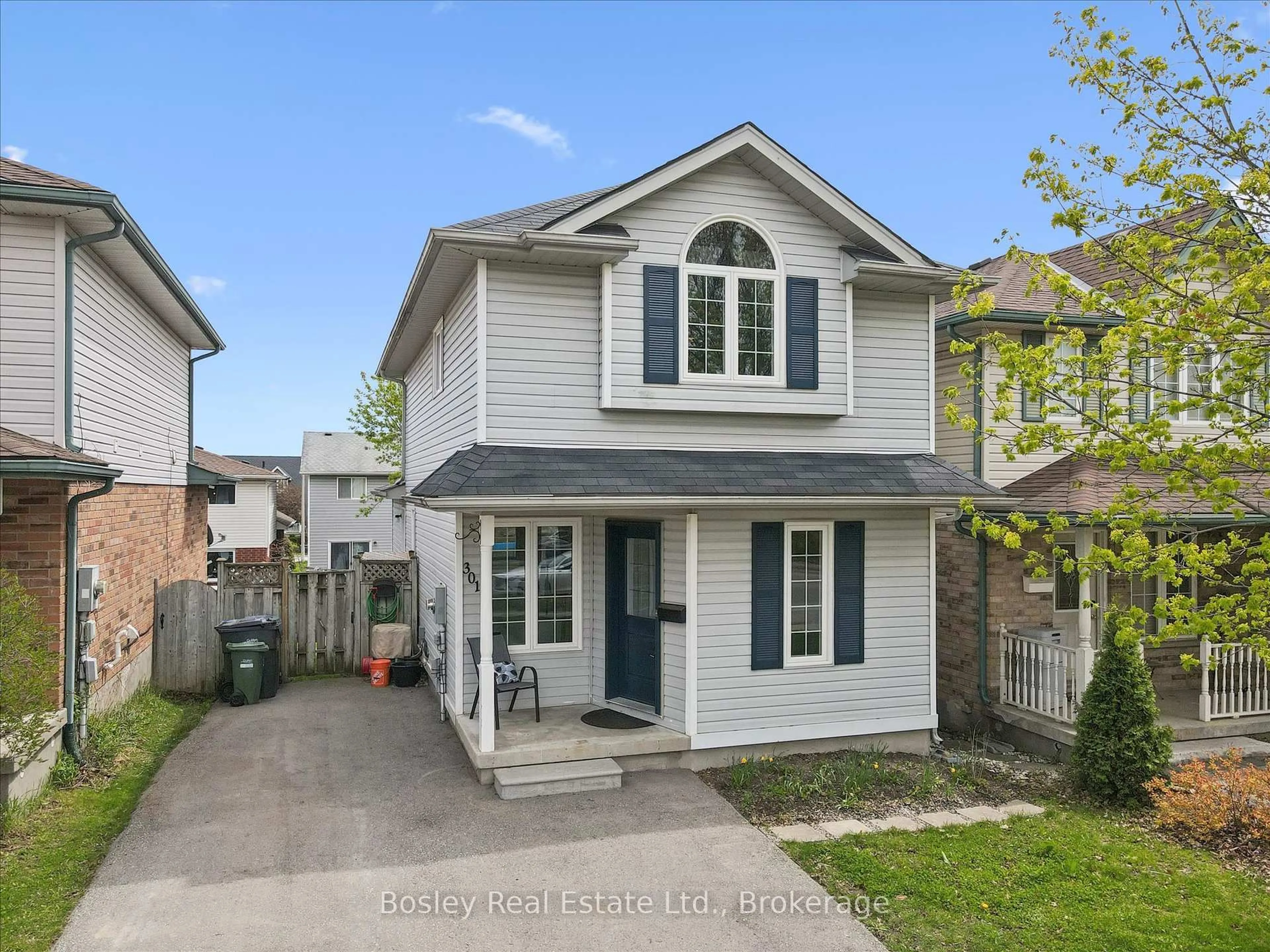 Home with vinyl exterior material, street for 301 Grange Rd, Guelph Ontario N1E 7B5