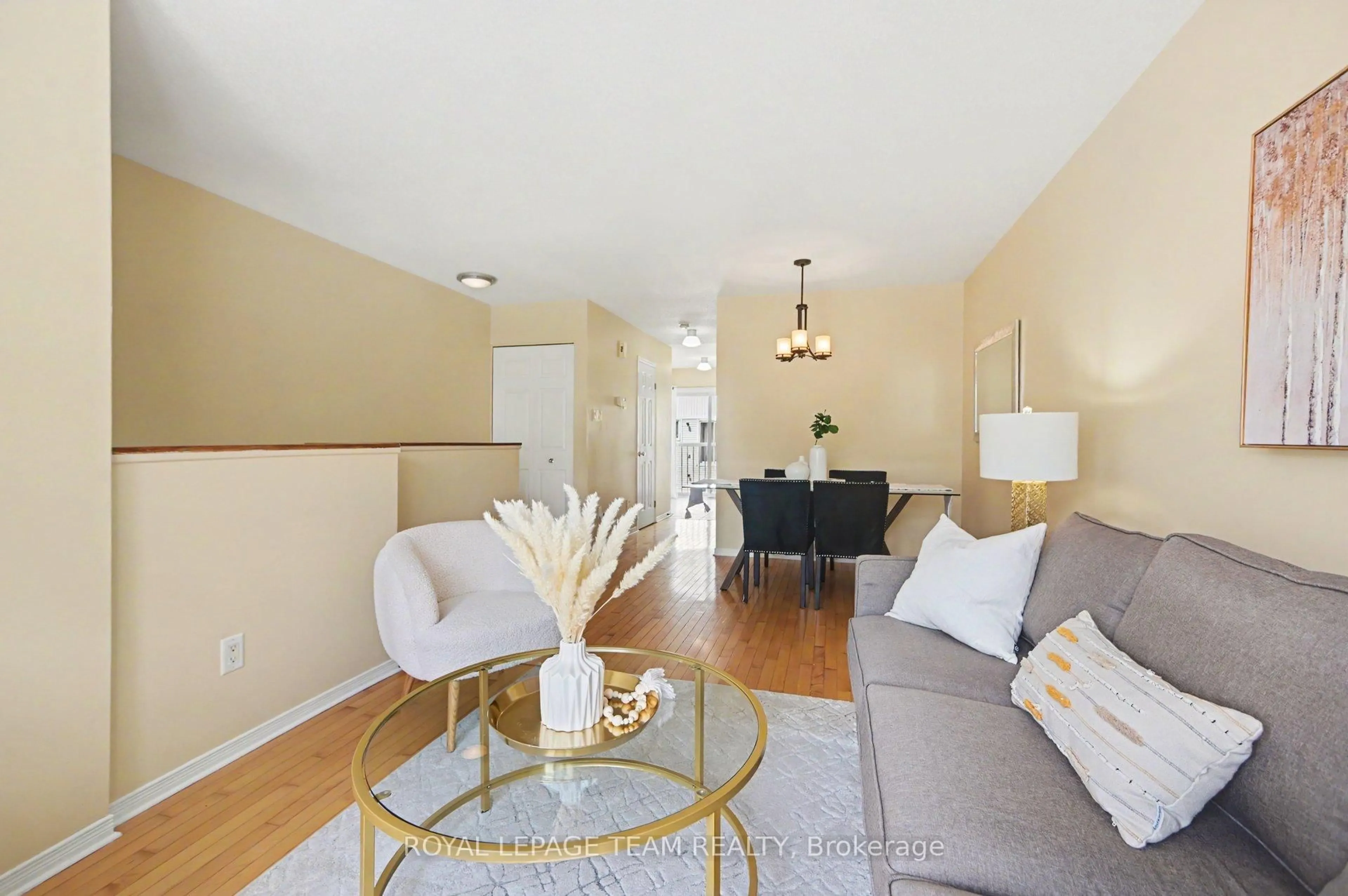 Living room with furniture, wood/laminate floor for 22 Yorkville St, Ottawa Ontario K2C 4B6