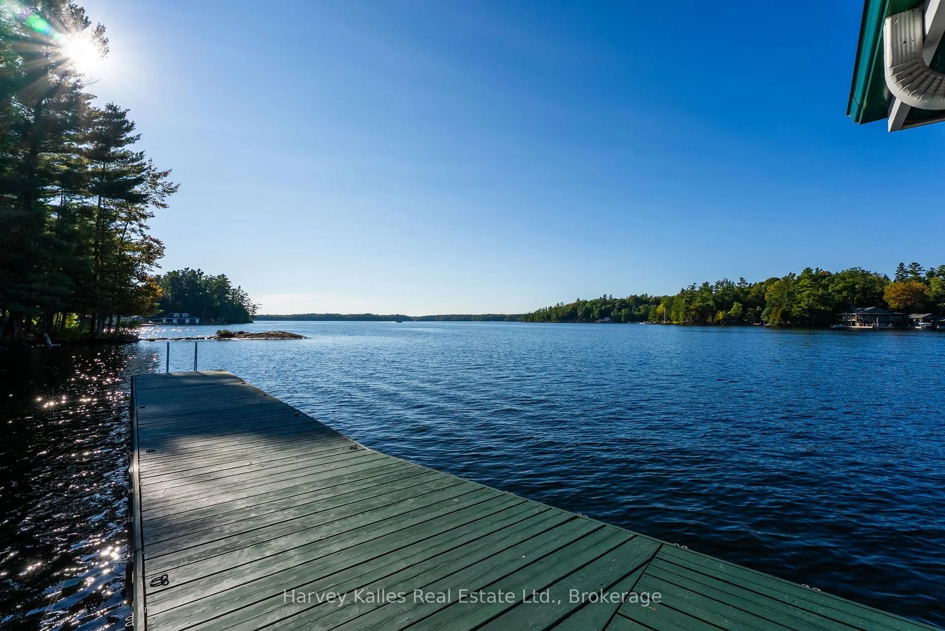 A pic from outside/outdoor area/front of a property/back of a property/a pic from drone, water/lake/river/ocean view for 1052 Longhurst Rd #22, Muskoka Lakes Ontario P0B 1J0