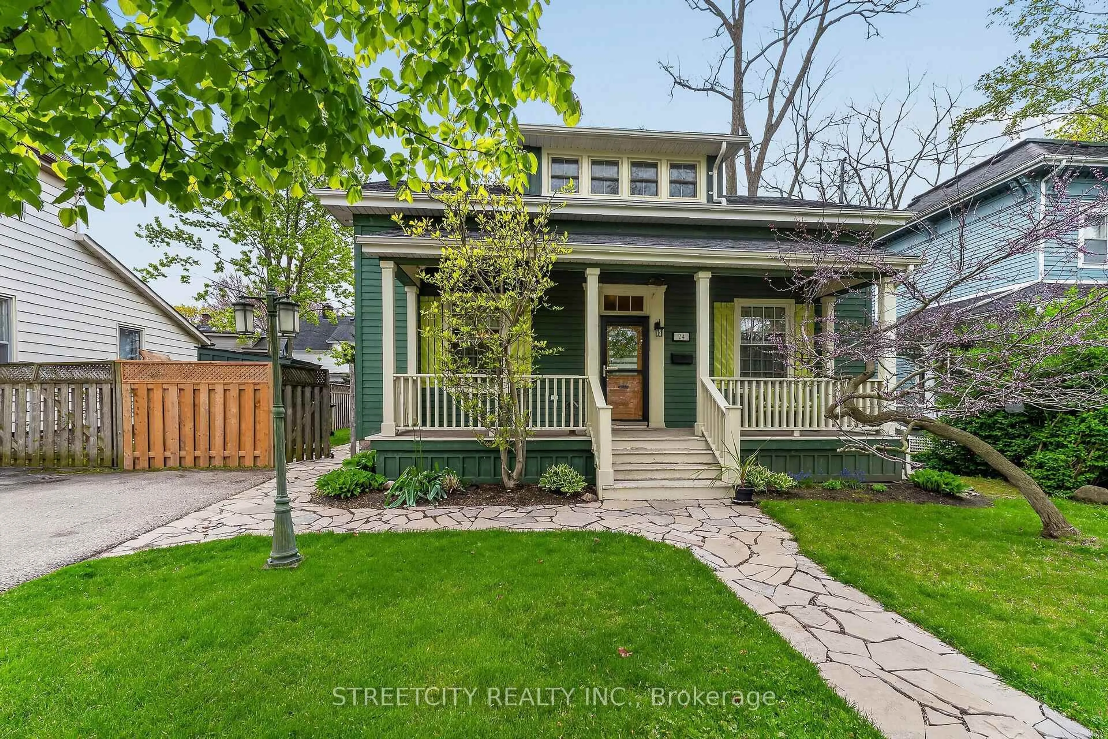 Home with brick exterior material, street for 24 Centre St, St. Thomas Ontario N5R 2Z2