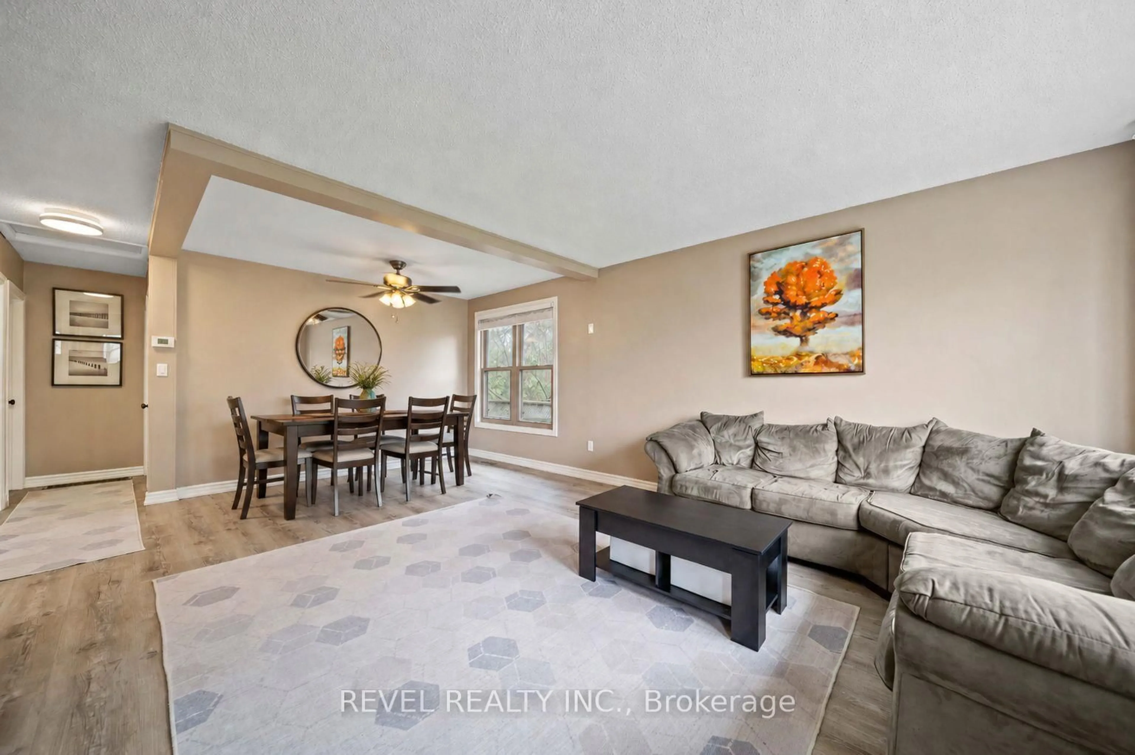 Living room with furniture, ceramic/tile floor for 73 Queenston Cres, London East Ontario N5W 1N7