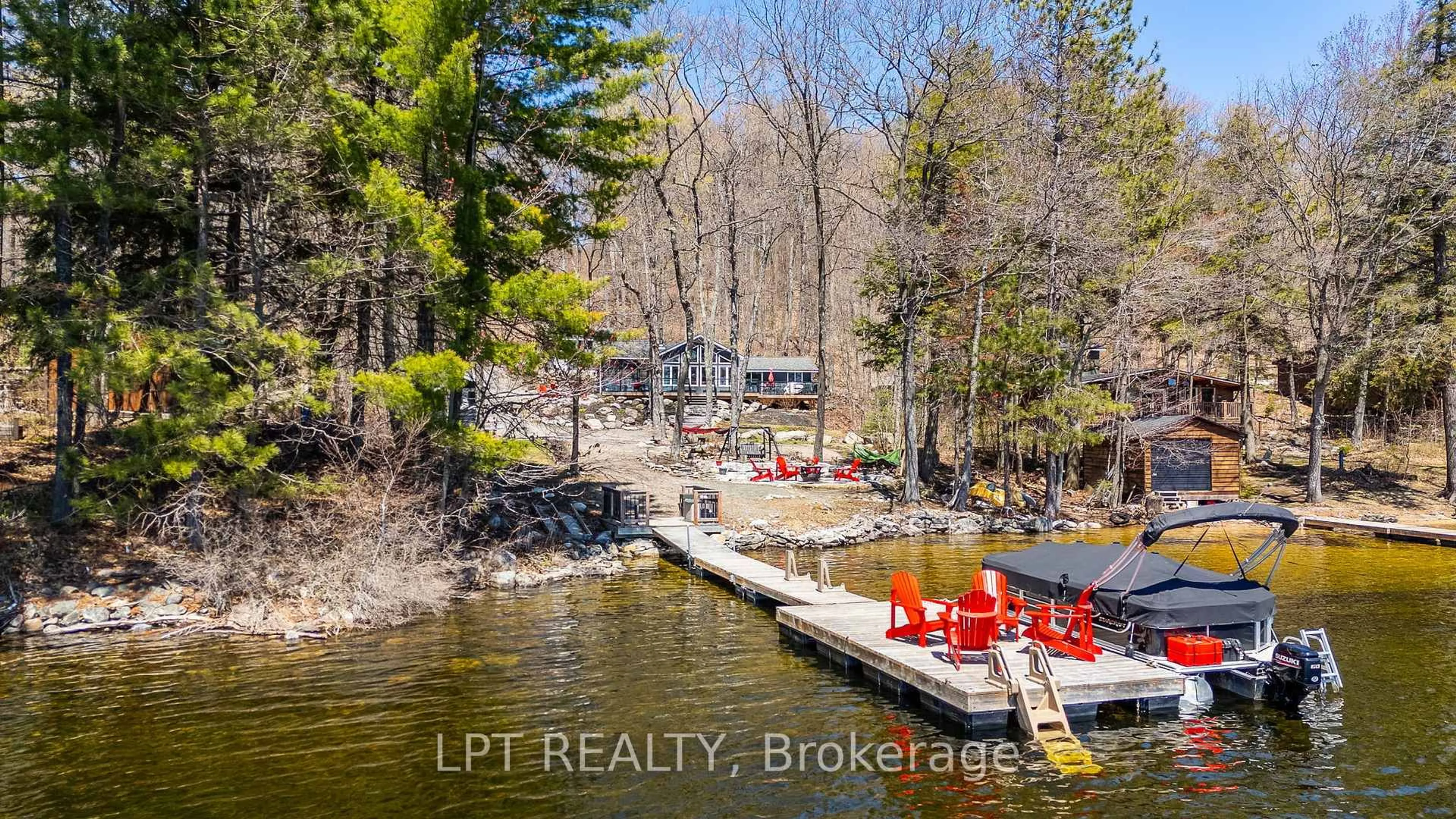 A pic from outside/outdoor area/front of a property/back of a property/a pic from drone, water/lake/river/ocean view for 1369 Hipkiss Dr, Dysart et al Ontario K0M 1S0