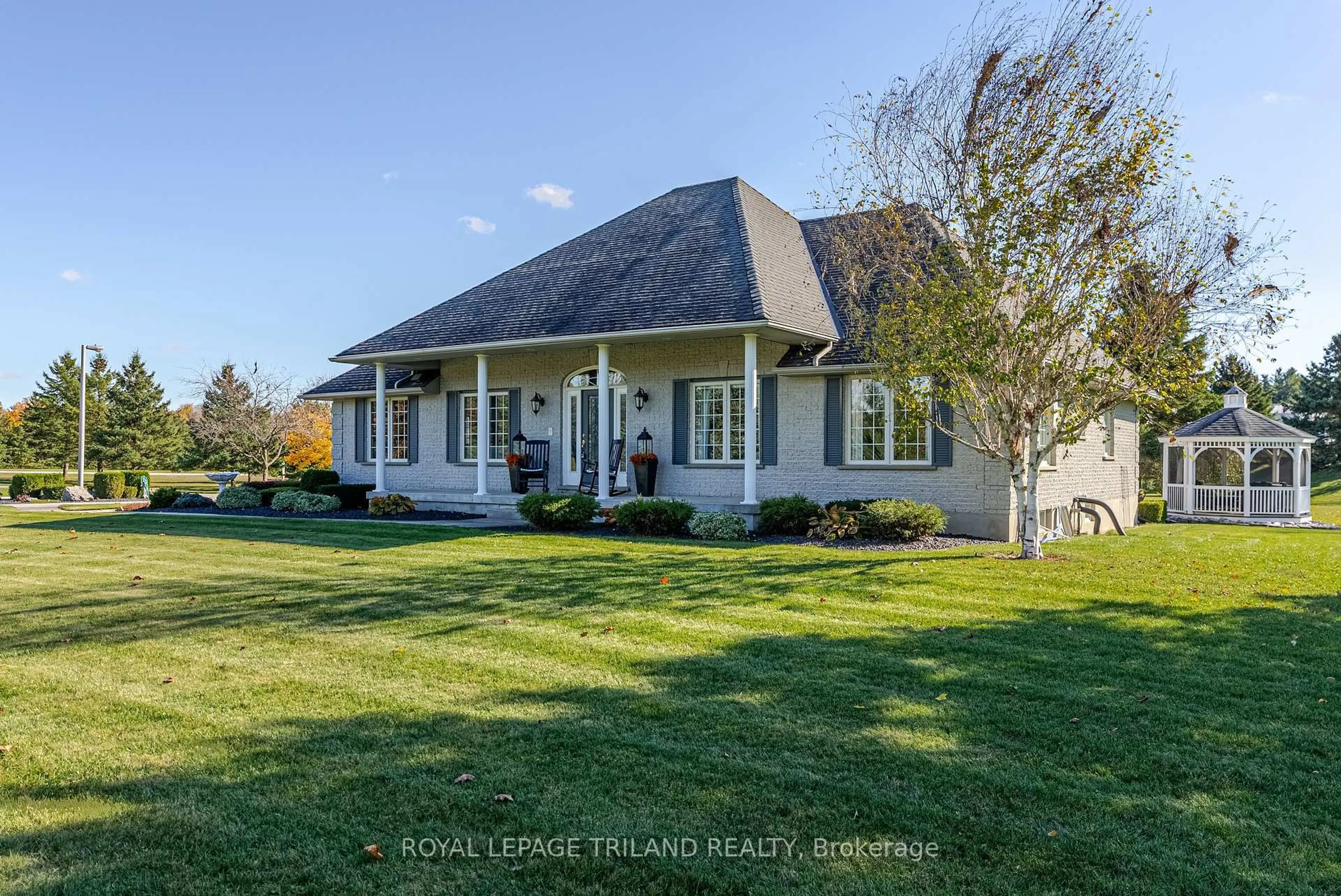 Home with vinyl exterior material, street for 5017 Hamilton Rd, Thames Centre Ontario N0L 1G6