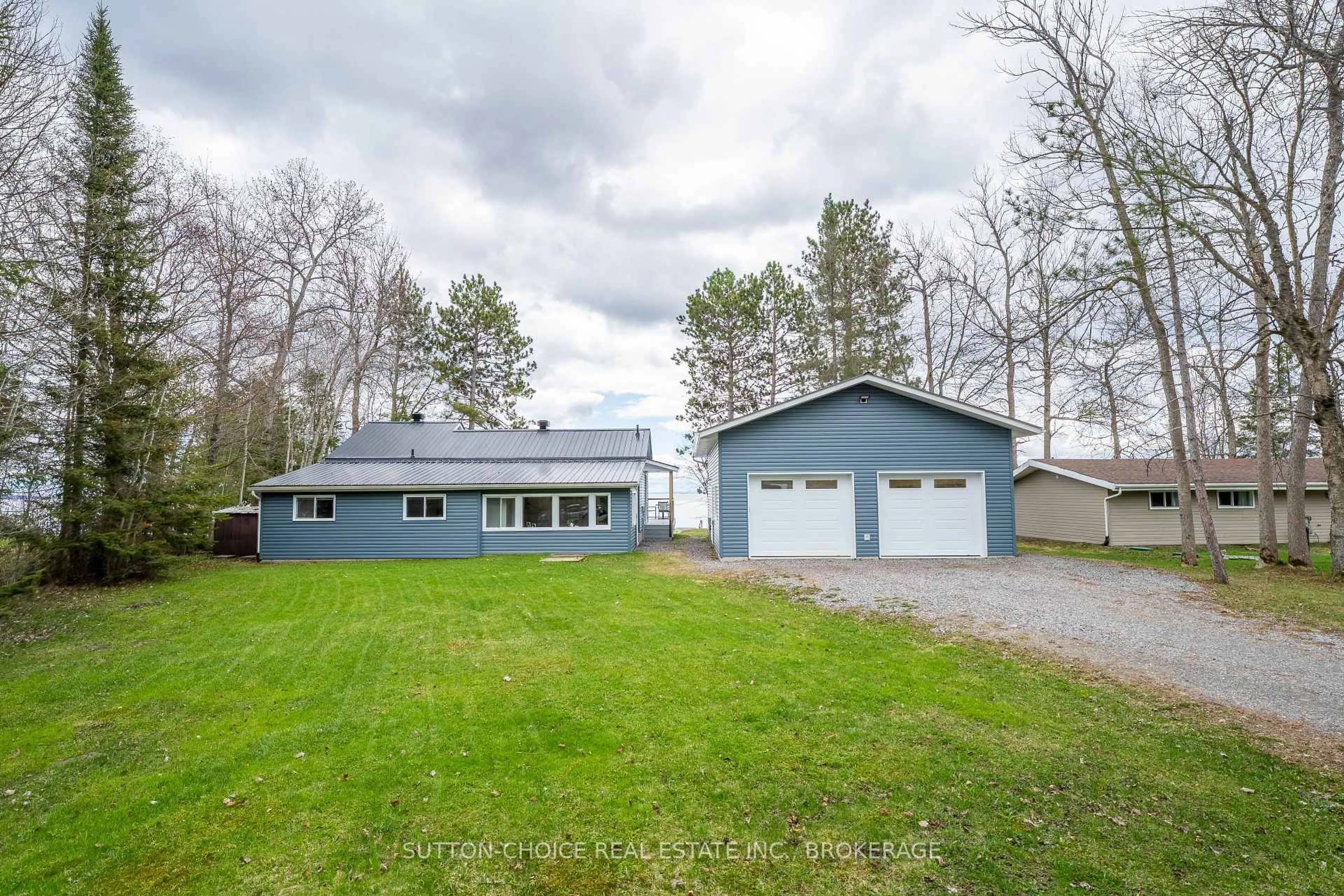 A pic from outside/outdoor area/front of a property/back of a property/a pic from drone, unknown for 399 Jocko Point Rd, North Bay Ontario P1B 8G5