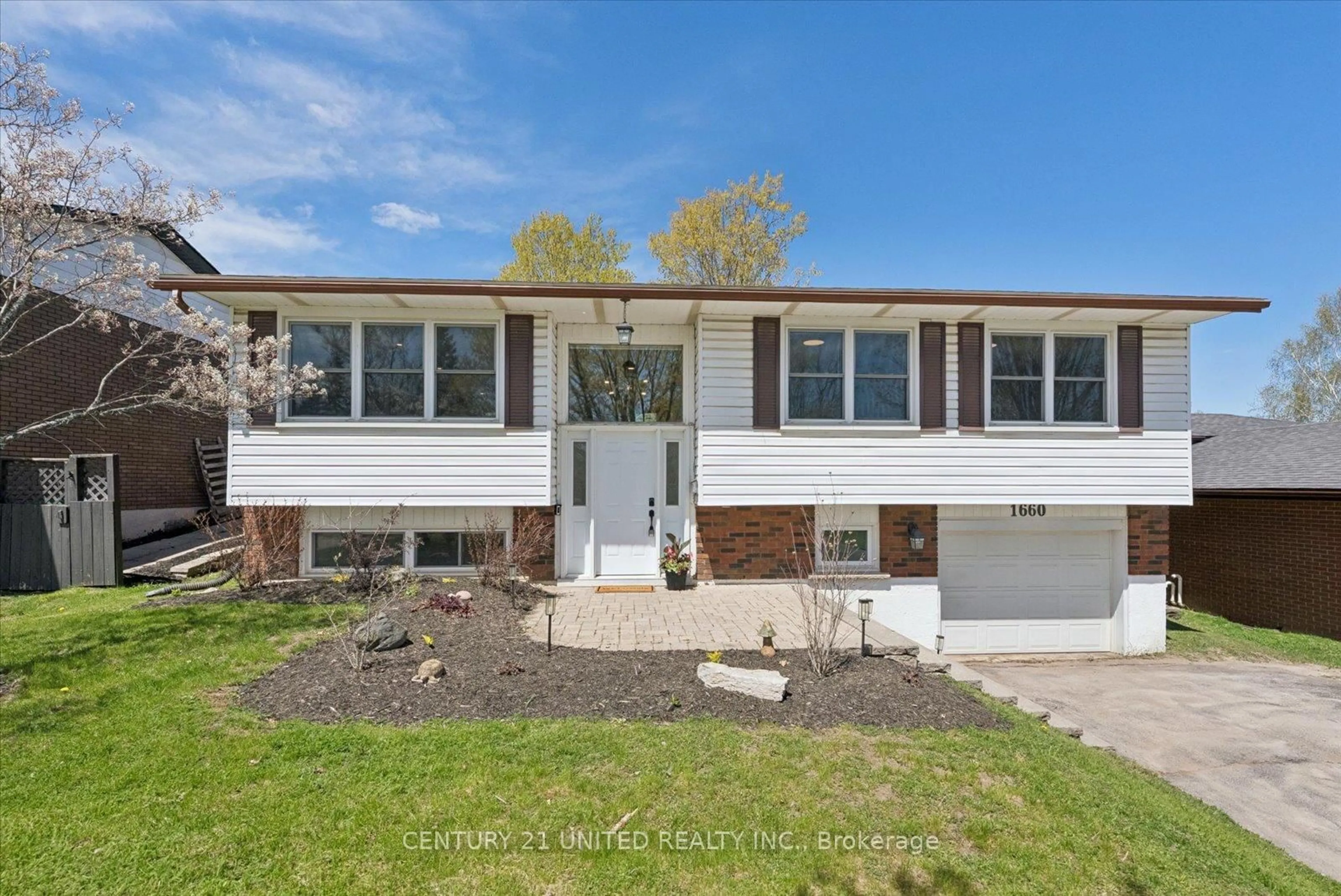 Home with vinyl exterior material, street for 1660 Cherryhill Rd, Peterborough Ontario K9K 1B1