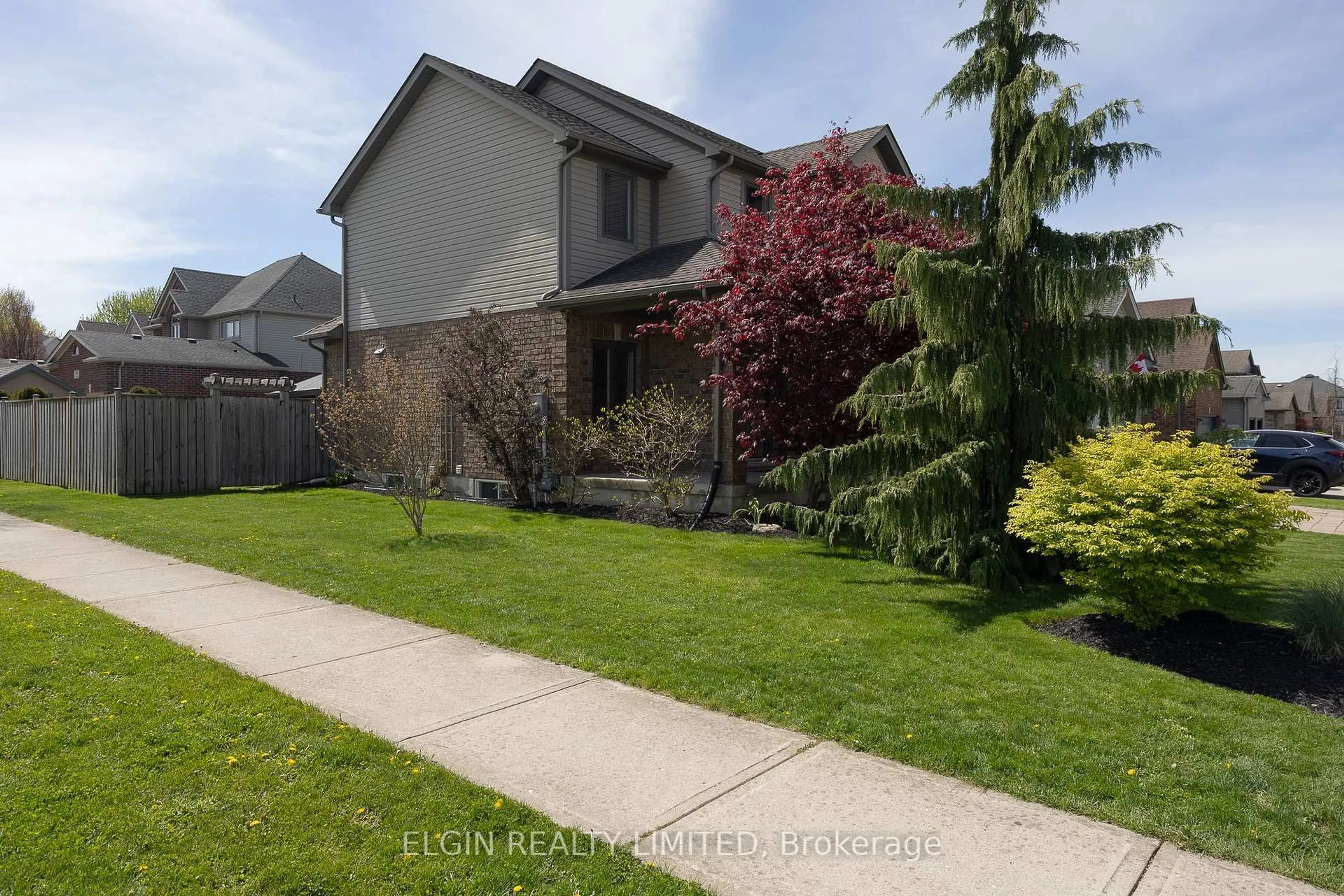 A pic from outside/outdoor area/front of a property/back of a property/a pic from drone, street for 2062 Westwick Walk, London South Ontario N6P 0A2