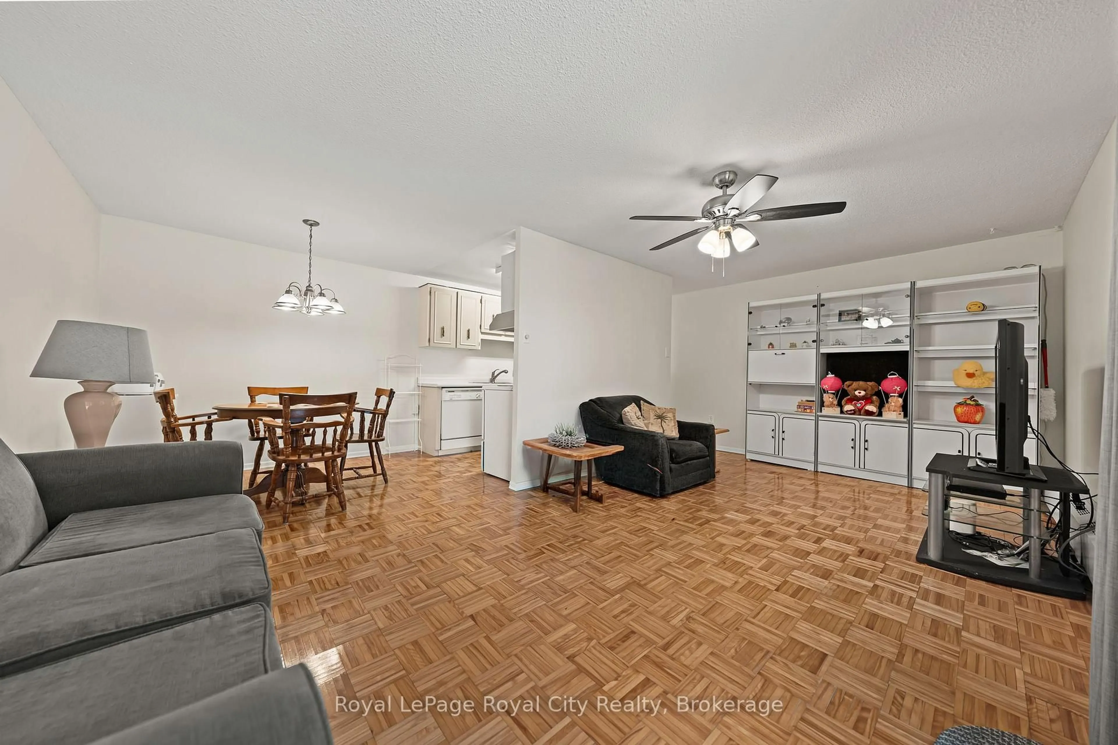 Living room with furniture, unknown for 234 Willow Rd #102, Guelph Ontario N1H 7C6