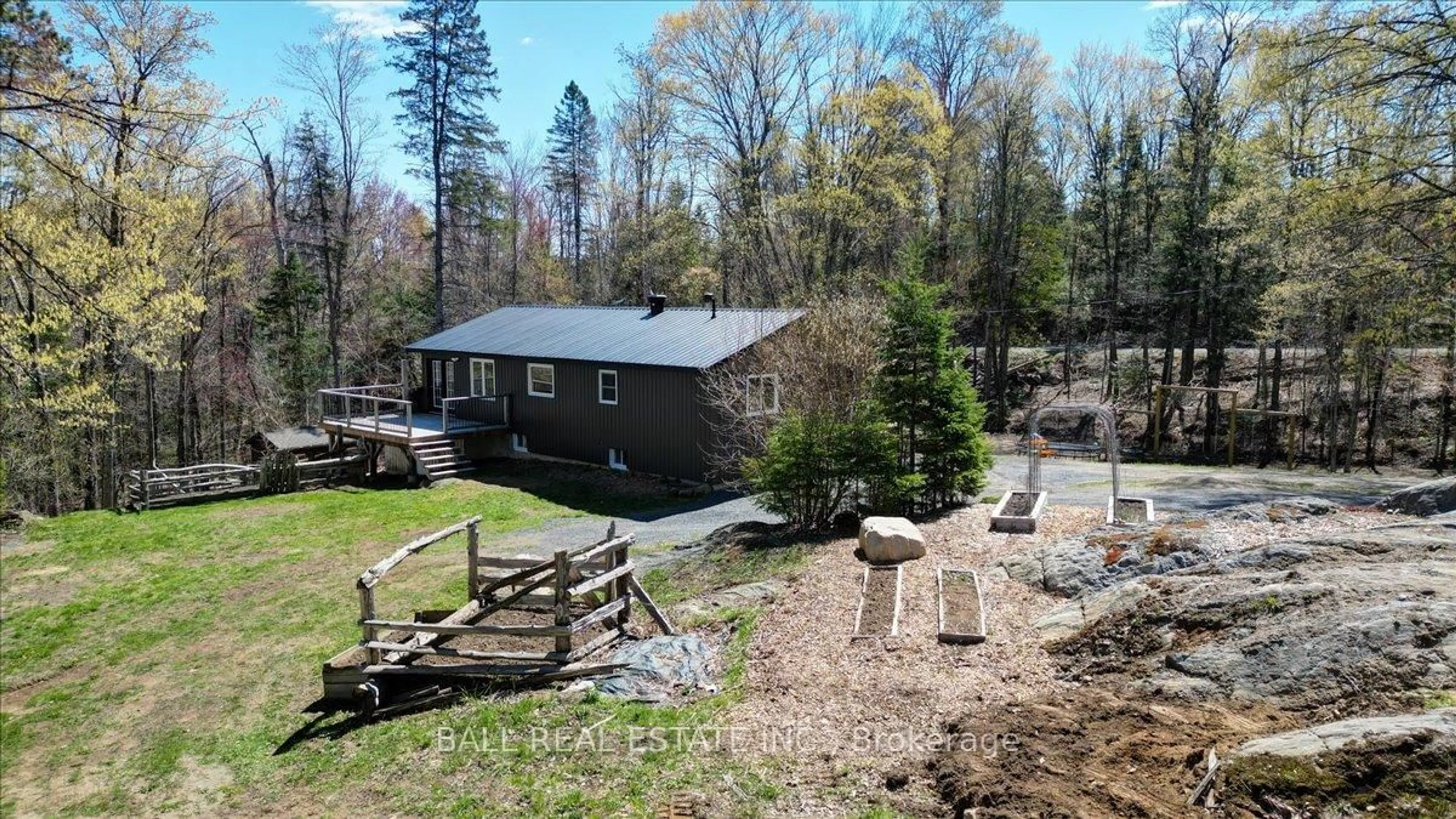 A pic from outside/outdoor area/front of a property/back of a property/a pic from drone, forest/trees view for 832 Lasswade Rd, North Kawartha Ontario K0L 1A0