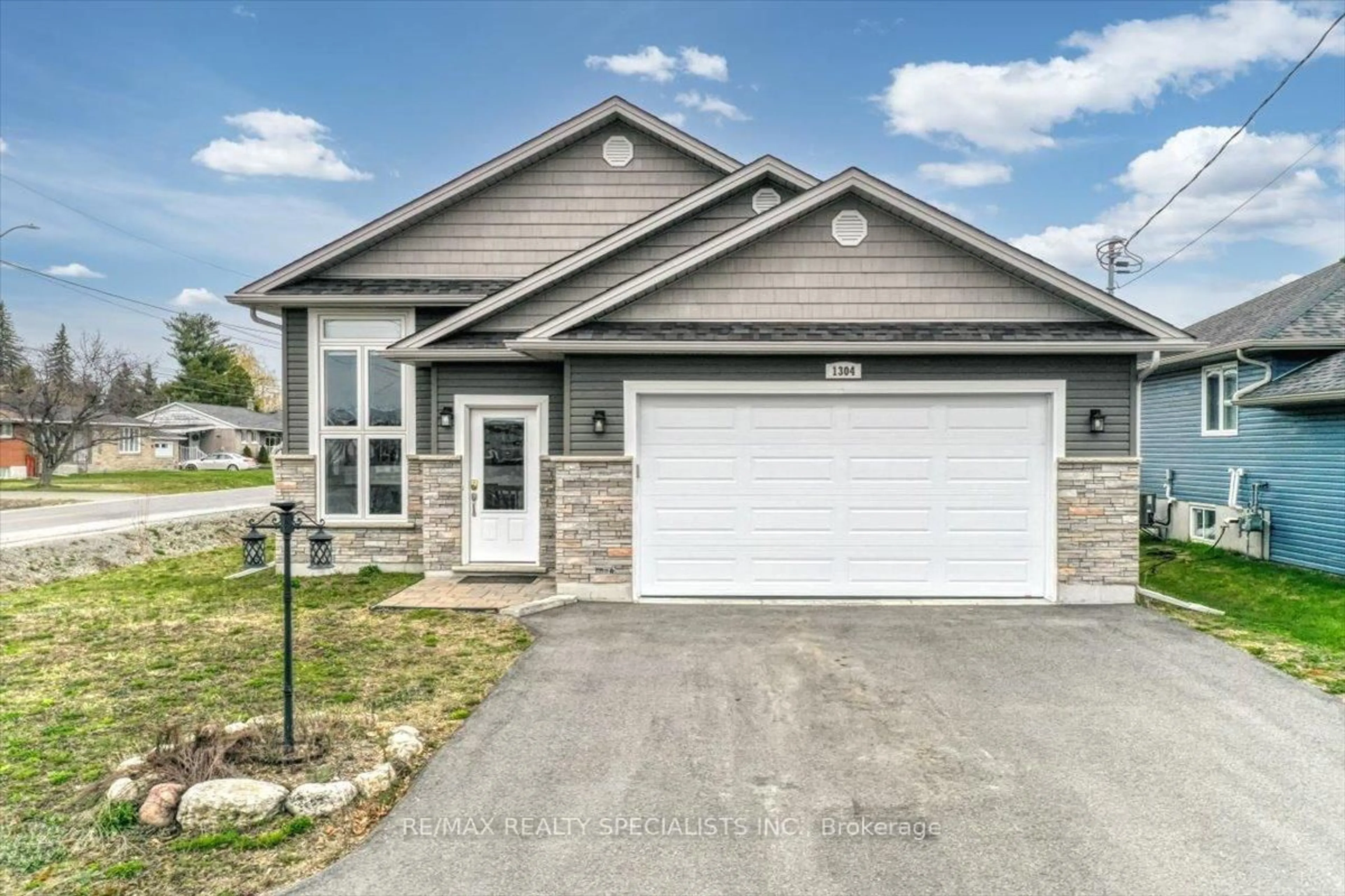 Home with vinyl exterior material, street for 1304 Lamothe St, Greater Sudbury Ontario P3A 0C6