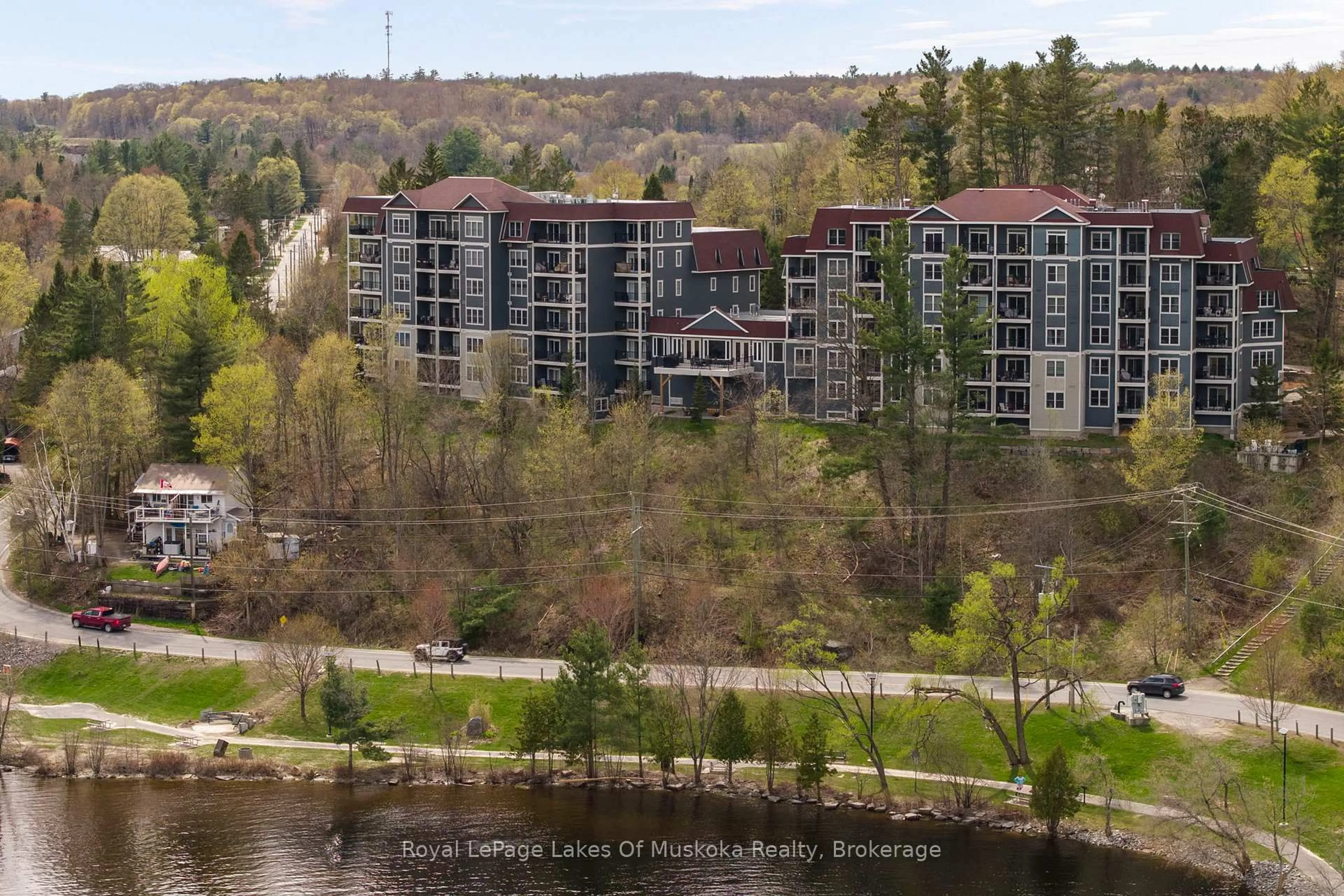 A pic from outside/outdoor area/front of a property/back of a property/a pic from drone, water/lake/river/ocean view for 10 Kimberley Ave #103, Bracebridge Ontario P1L 0A4