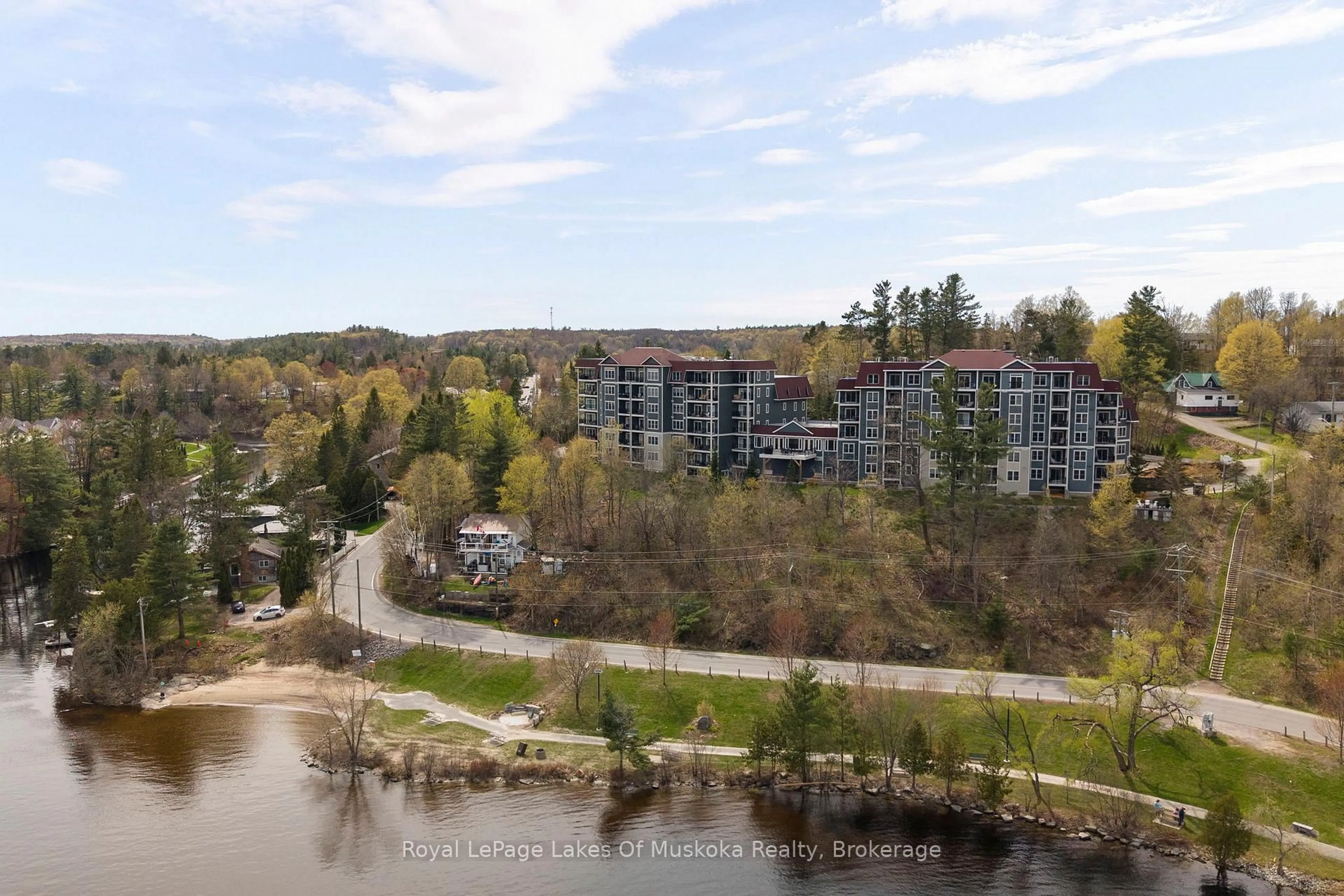 A pic from outside/outdoor area/front of a property/back of a property/a pic from drone, water/lake/river/ocean view for 10 Kimberley Ave #103, Bracebridge Ontario P1L 0A4