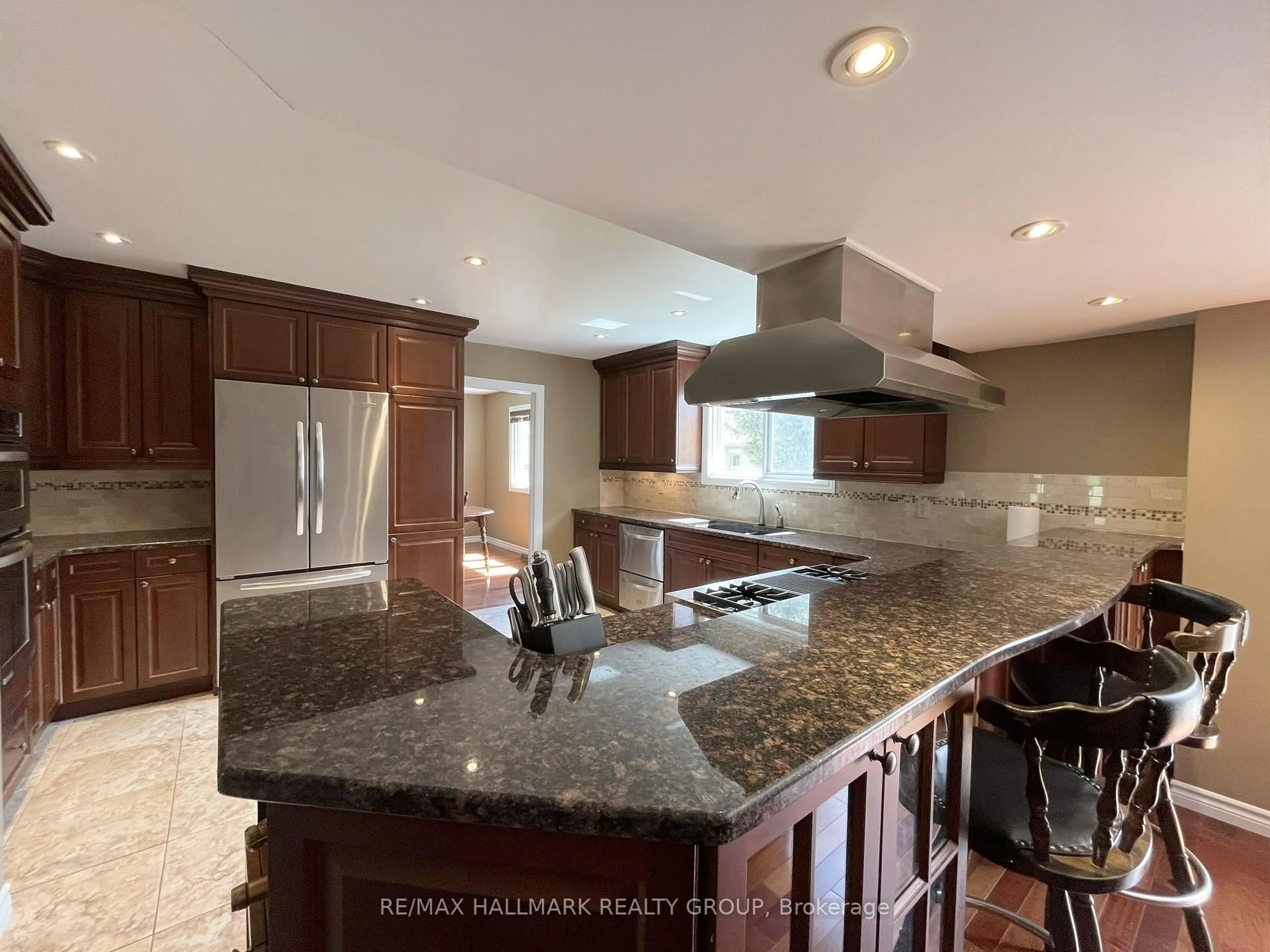 Open concept kitchen, ceramic/tile floor for 2 Inverness Ave, Ottawa Ontario K2E 6N5