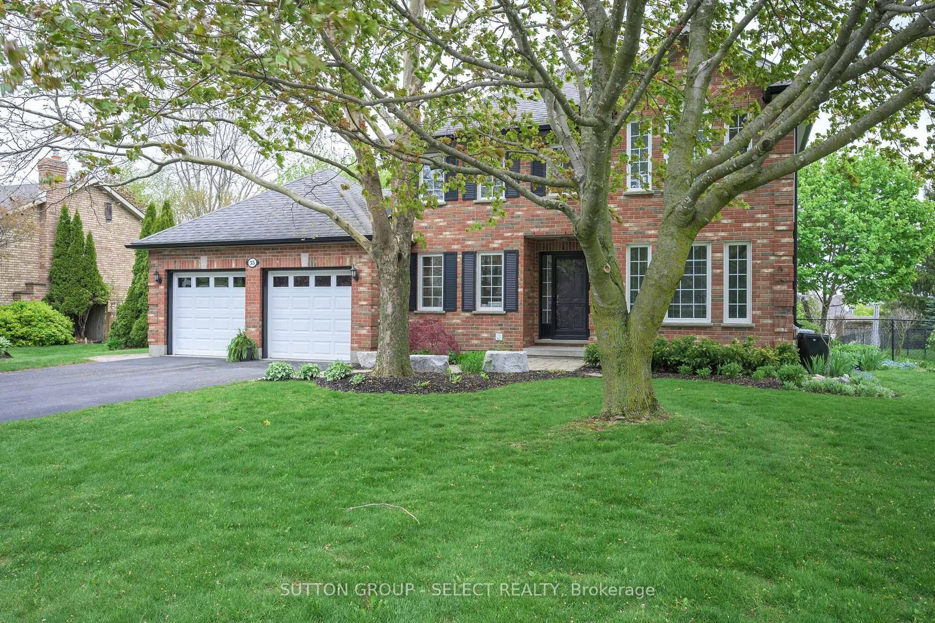 Home with brick exterior material, street for 55 Heritage Dr, Middlesex Centre Ontario N0M 2A0